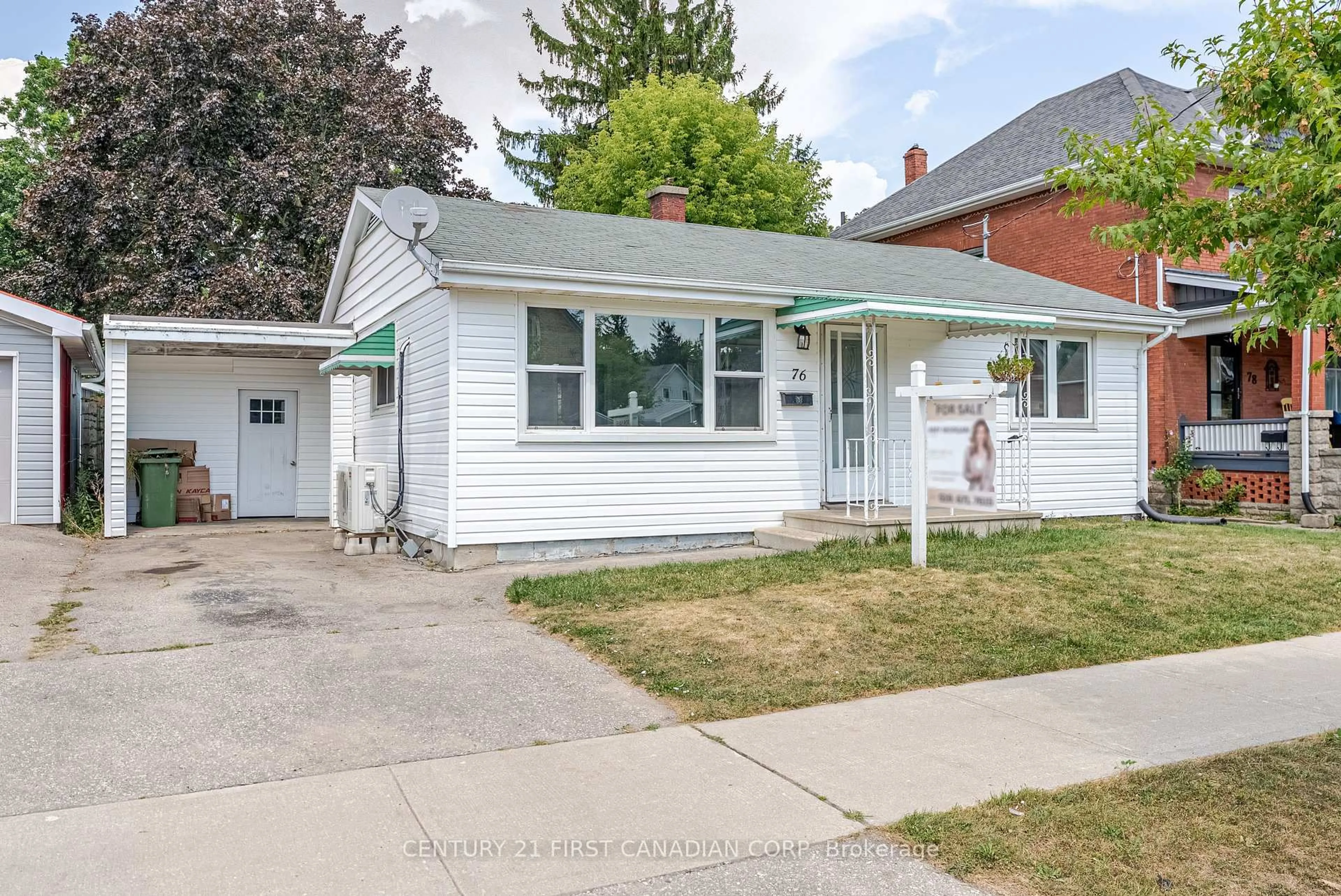 Home with vinyl exterior material, street for 76 Myrtle St, St. Thomas Ontario N5R 2G1