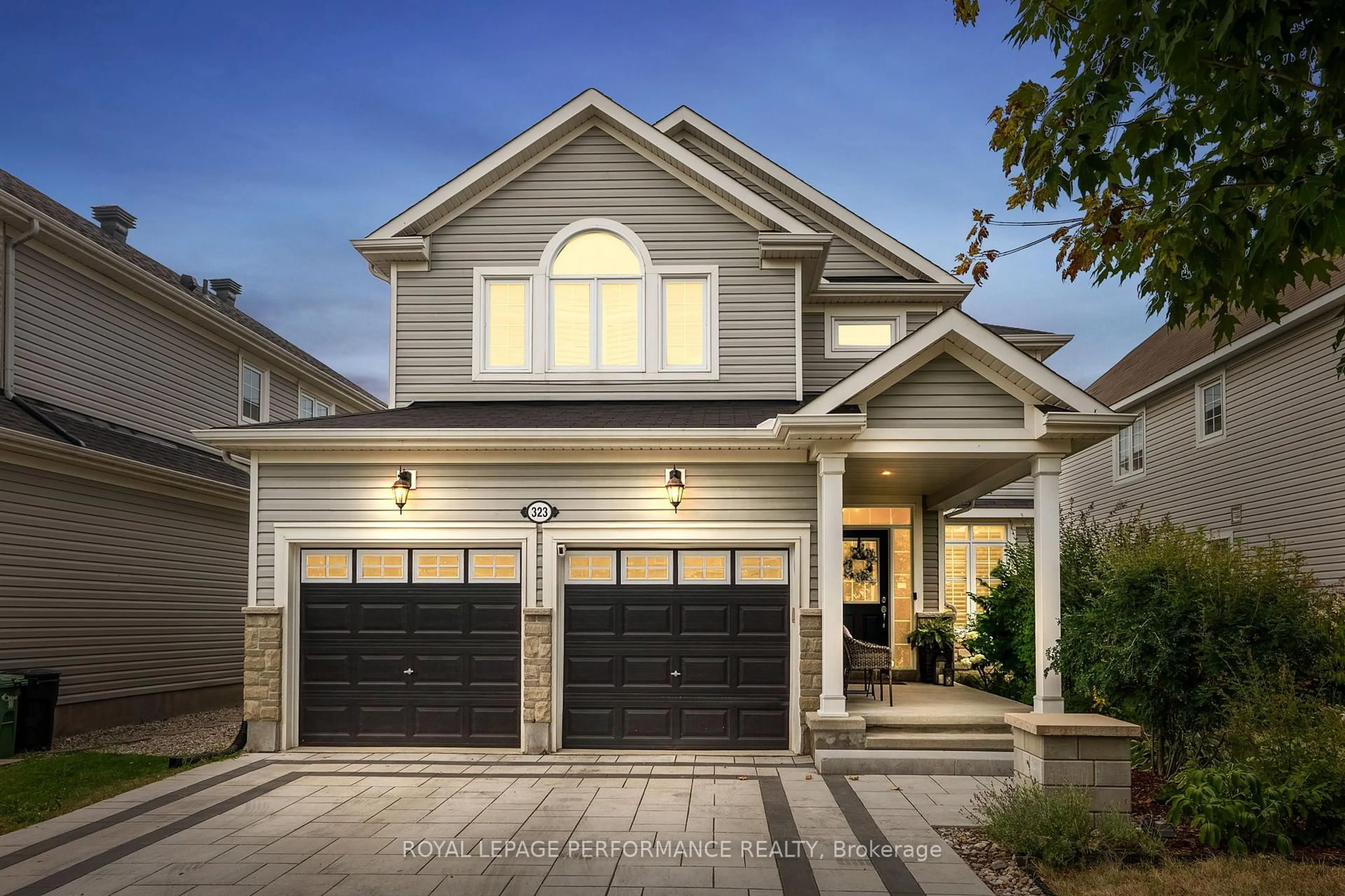 Home with vinyl exterior material, street for 323 Centerra Crt, Ottawa Ontario K2J 5T9