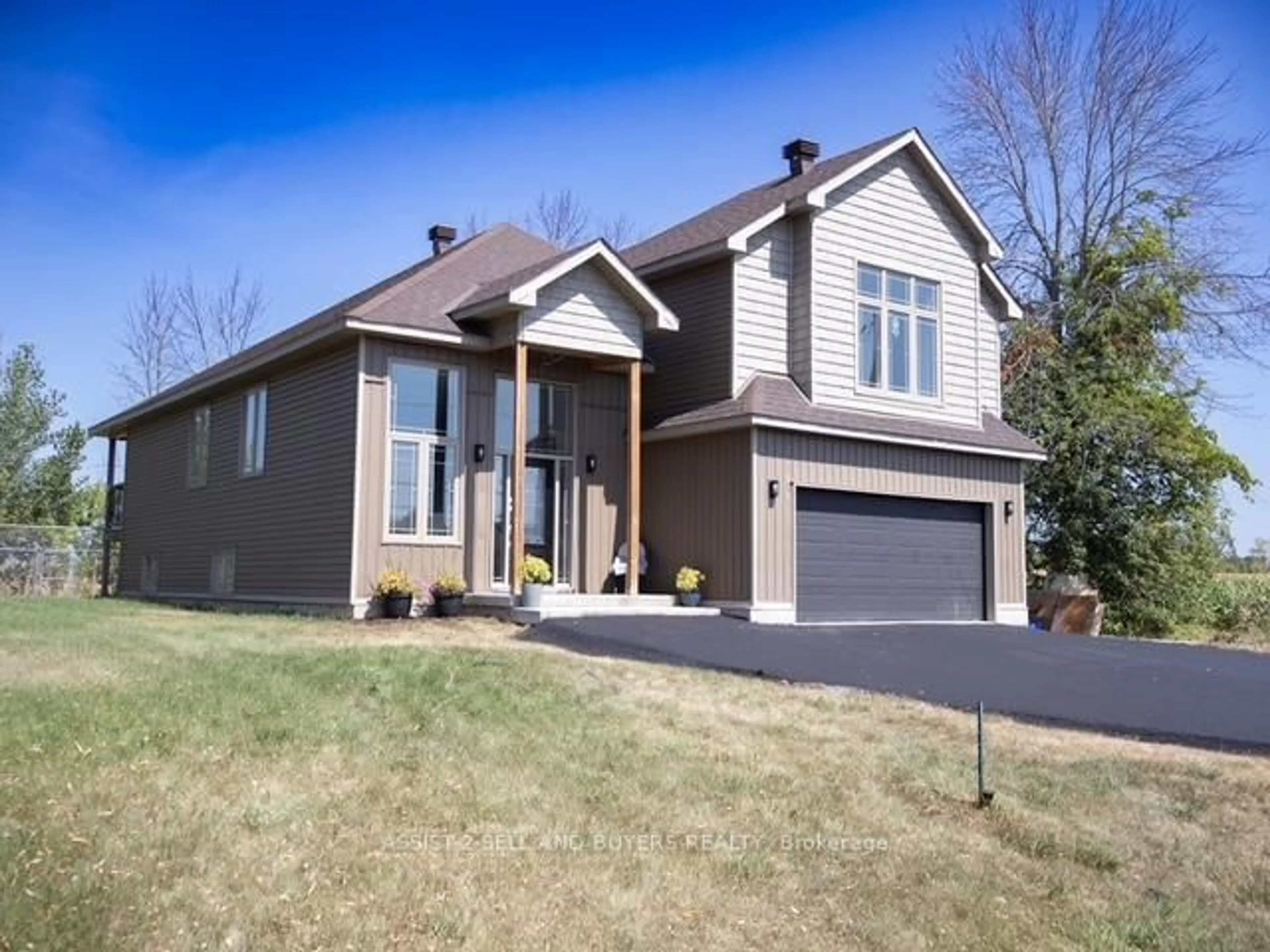 Home with vinyl exterior material, street for 15765 Manning Rd, South Stormont Ontario K0C 1M0