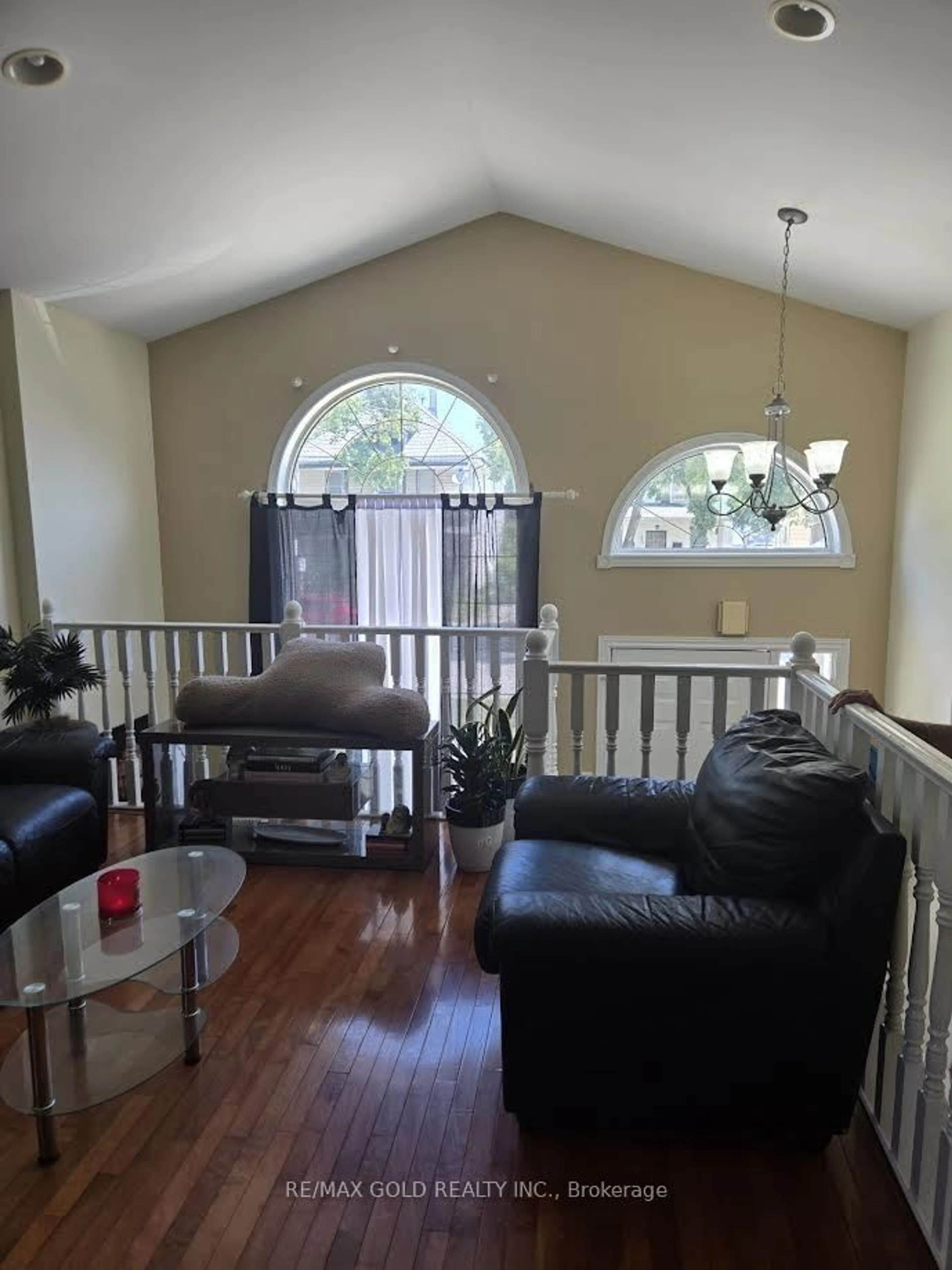 Living room with furniture, wood/laminate floor for 975 Albert Rd, Windsor Ontario N8Y 3P1