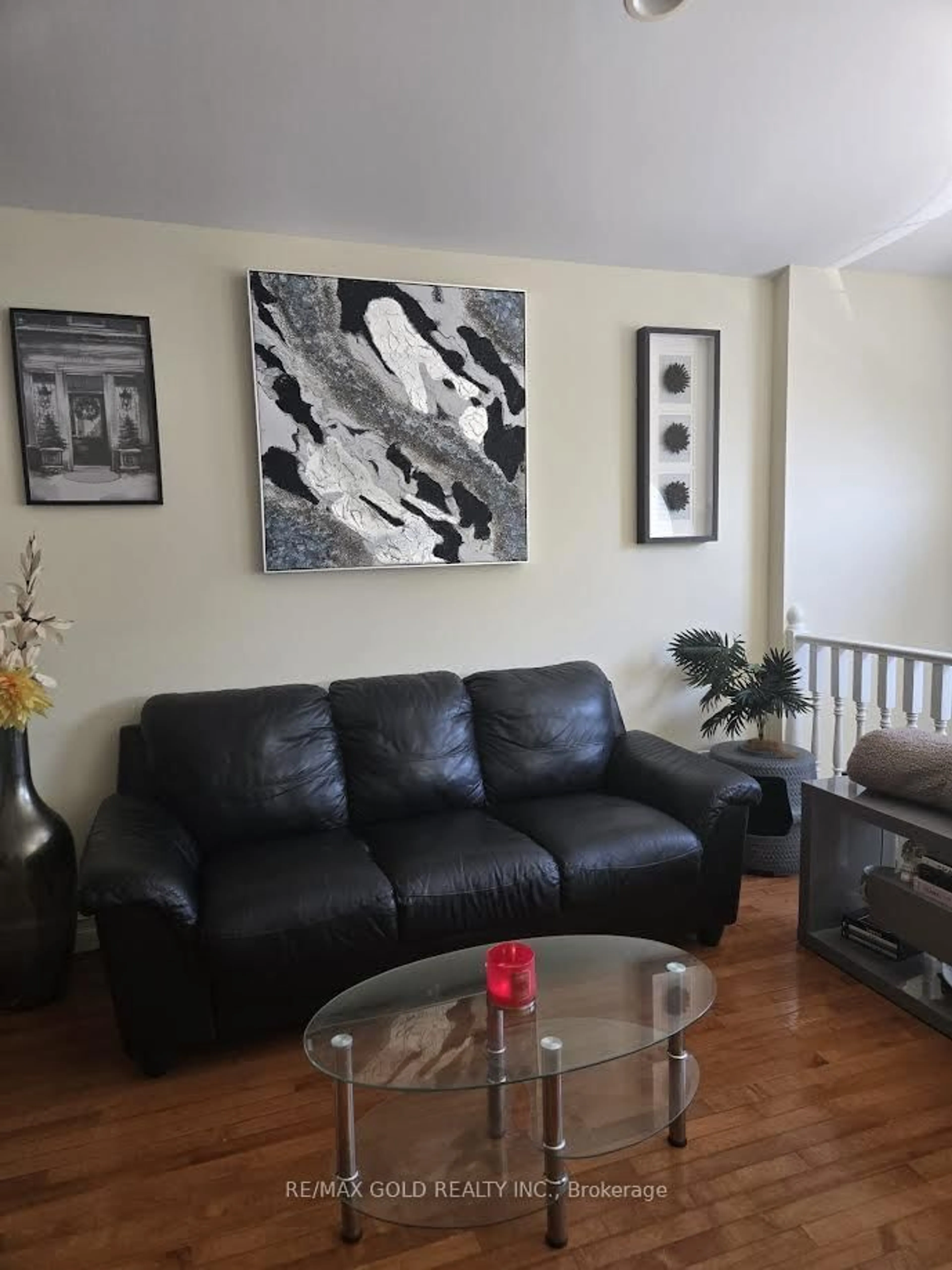 Living room with furniture, wood/laminate floor for 975 Albert Rd, Windsor Ontario N8Y 3P1