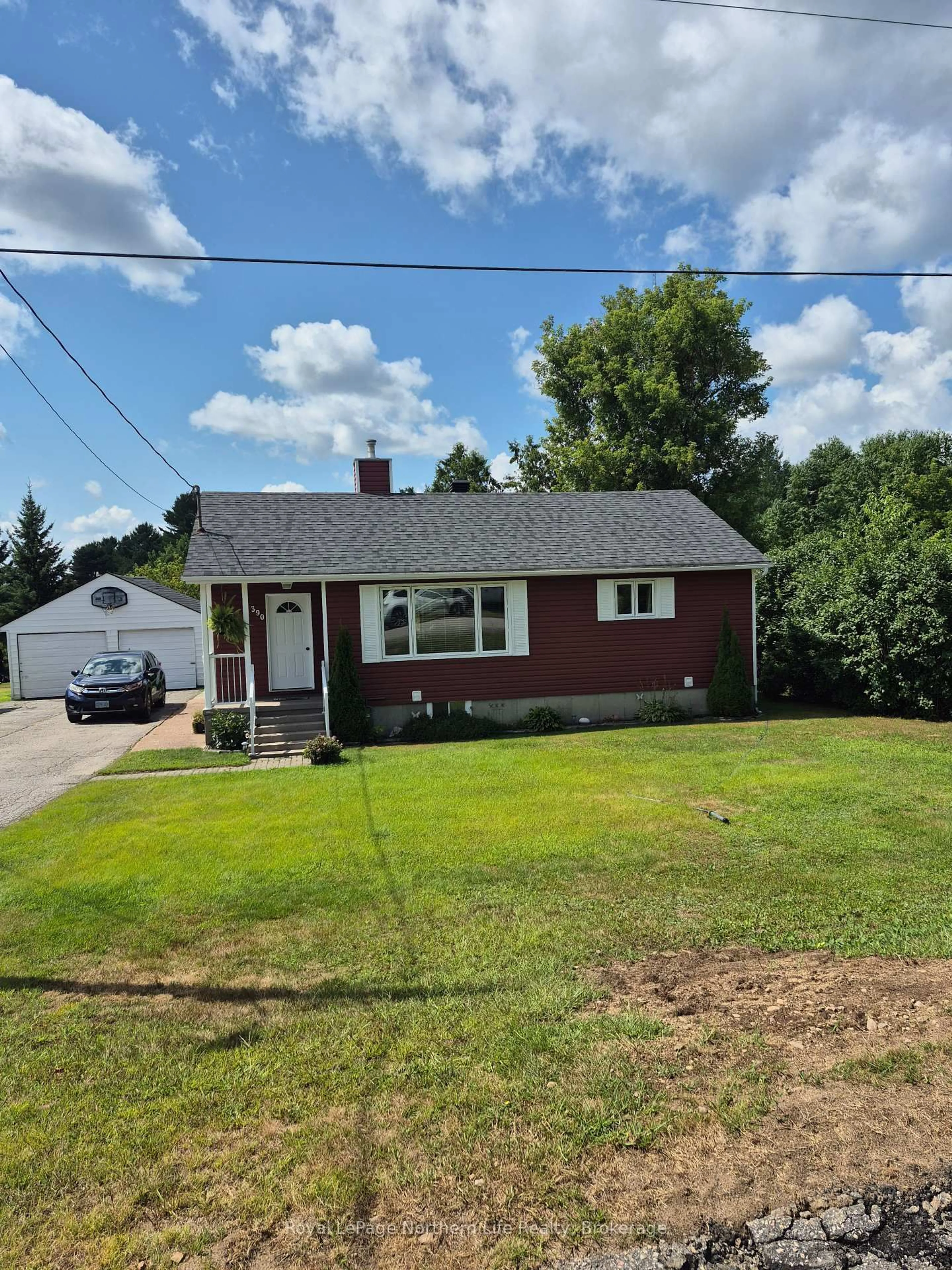 A pic from outside/outdoor area/front of a property/back of a property/a pic from drone, street for 390 EIGHT St, Mattawa Ontario P0H 1V0