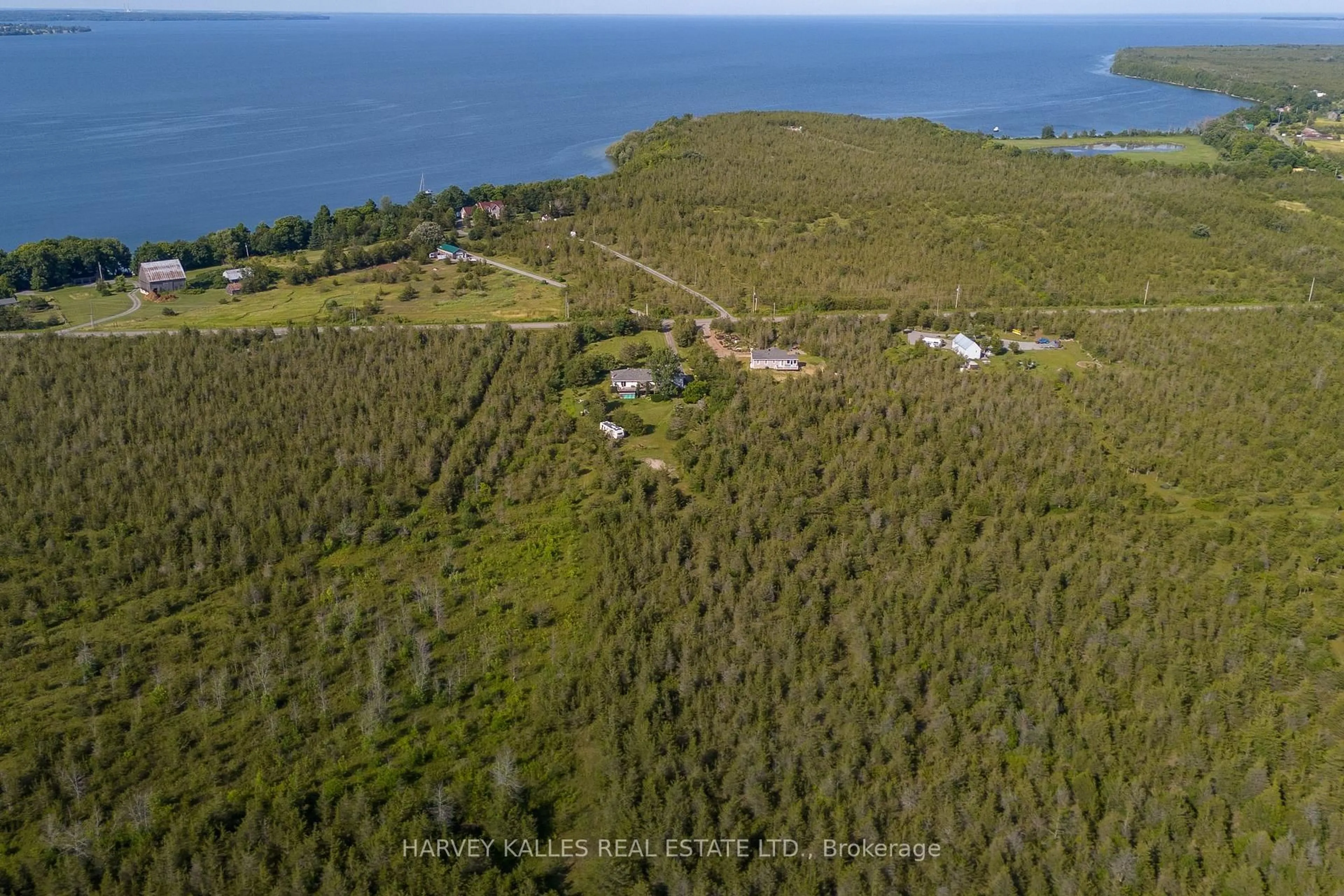 A pic from outside/outdoor area/front of a property/back of a property/a pic from drone, water/lake/river/ocean view for 3470 County Rd 13 Rd, Prince Edward County Ontario K0K 2T0