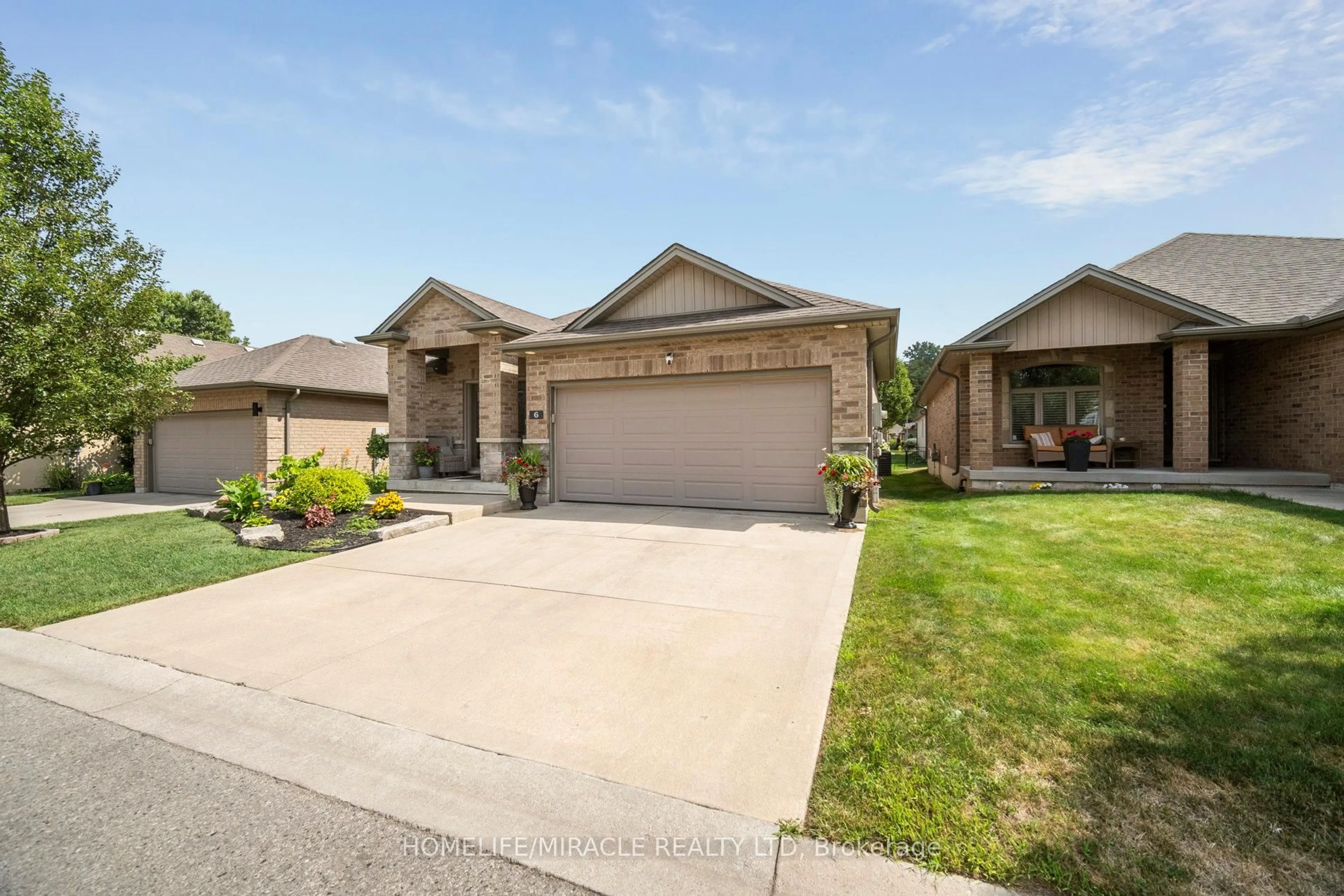 Home with brick exterior material, street for 1430 Highbury Ave #6, London East Ontario N5Y 6M4