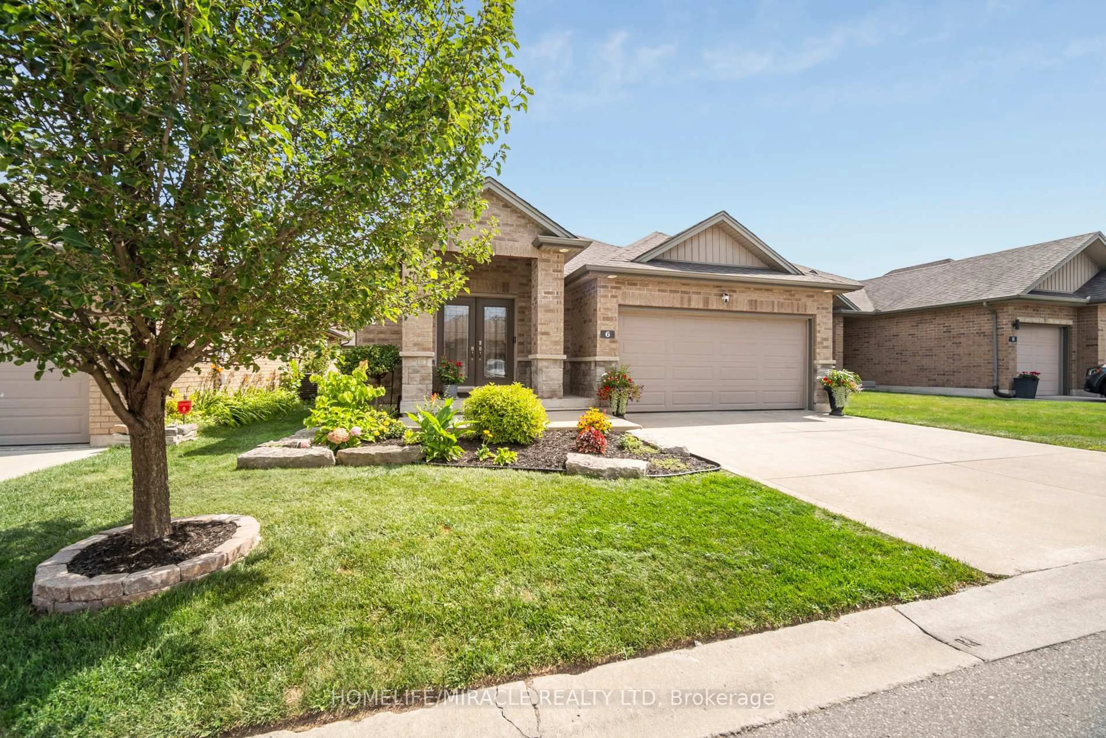 Home with brick exterior material, street for 1430 Highbury Ave #6, London East Ontario N5Y 6M4