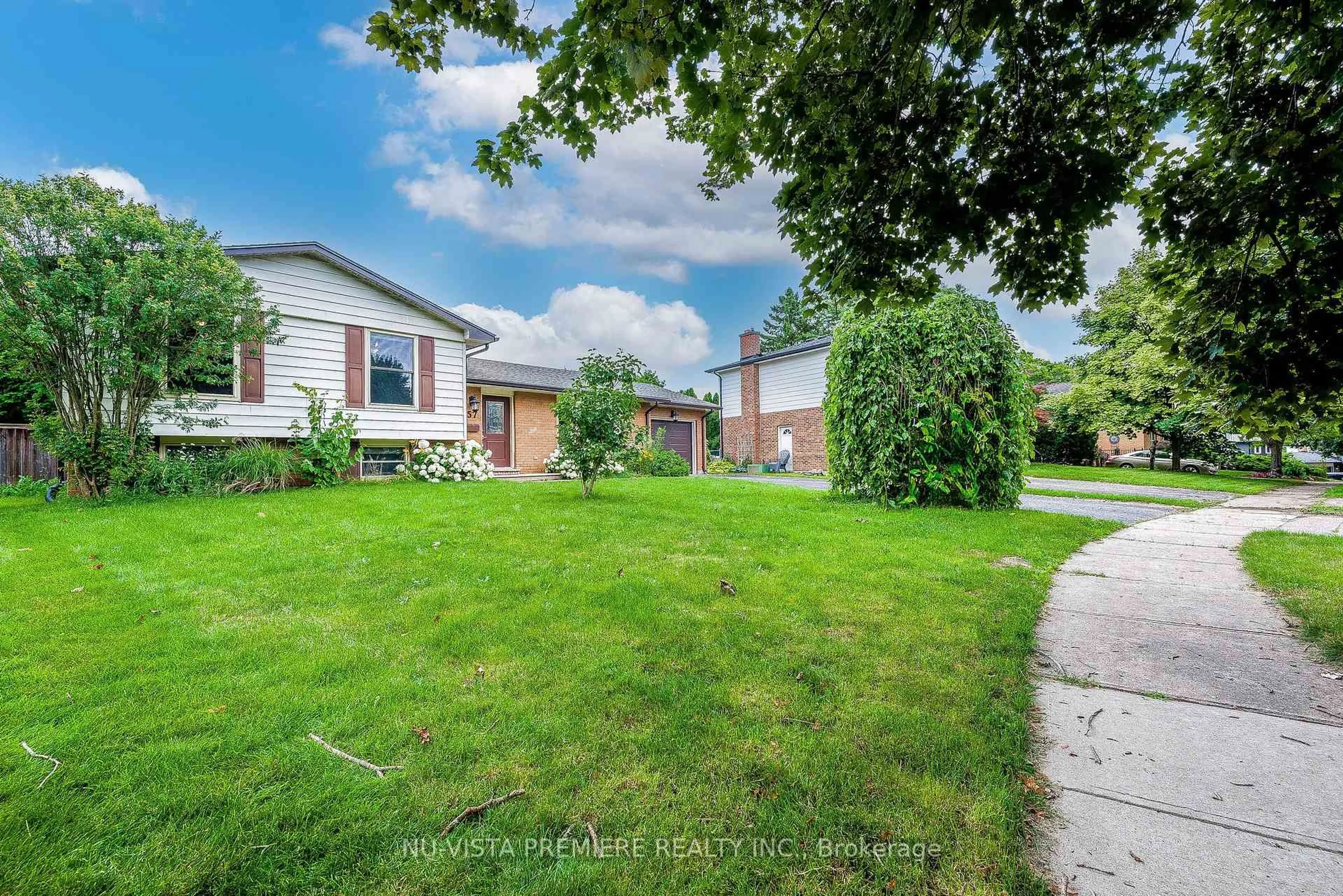 A pic from outside/outdoor area/front of a property/back of a property/a pic from drone, street for 57 McTaggart Cres, London North Ontario N5X 2E2
