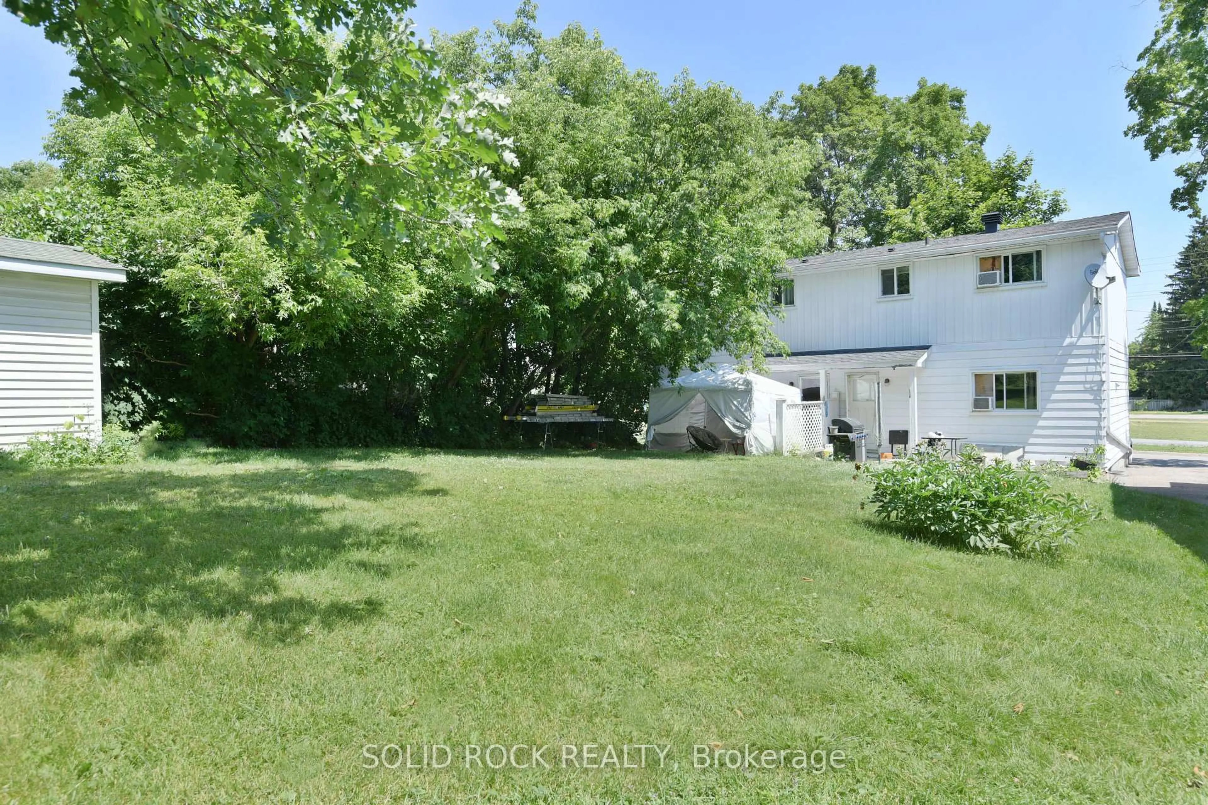A pic from outside/outdoor area/front of a property/back of a property/a pic from drone, unknown for 54 / 56 William St, Arnprior Ontario K7S 1J9