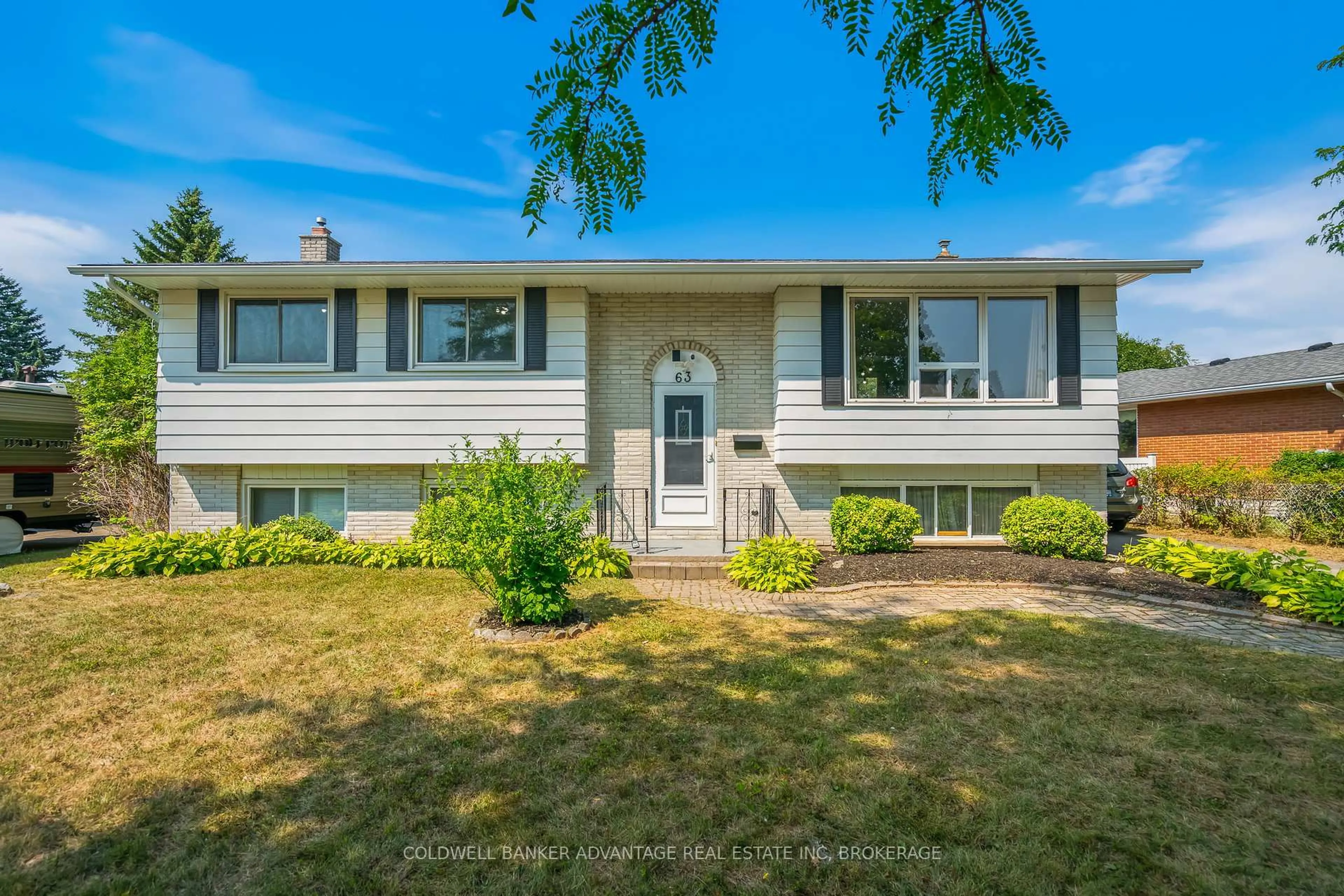 Home with vinyl exterior material, street for 63 Champlain Ave, Welland Ontario L3C 2L8