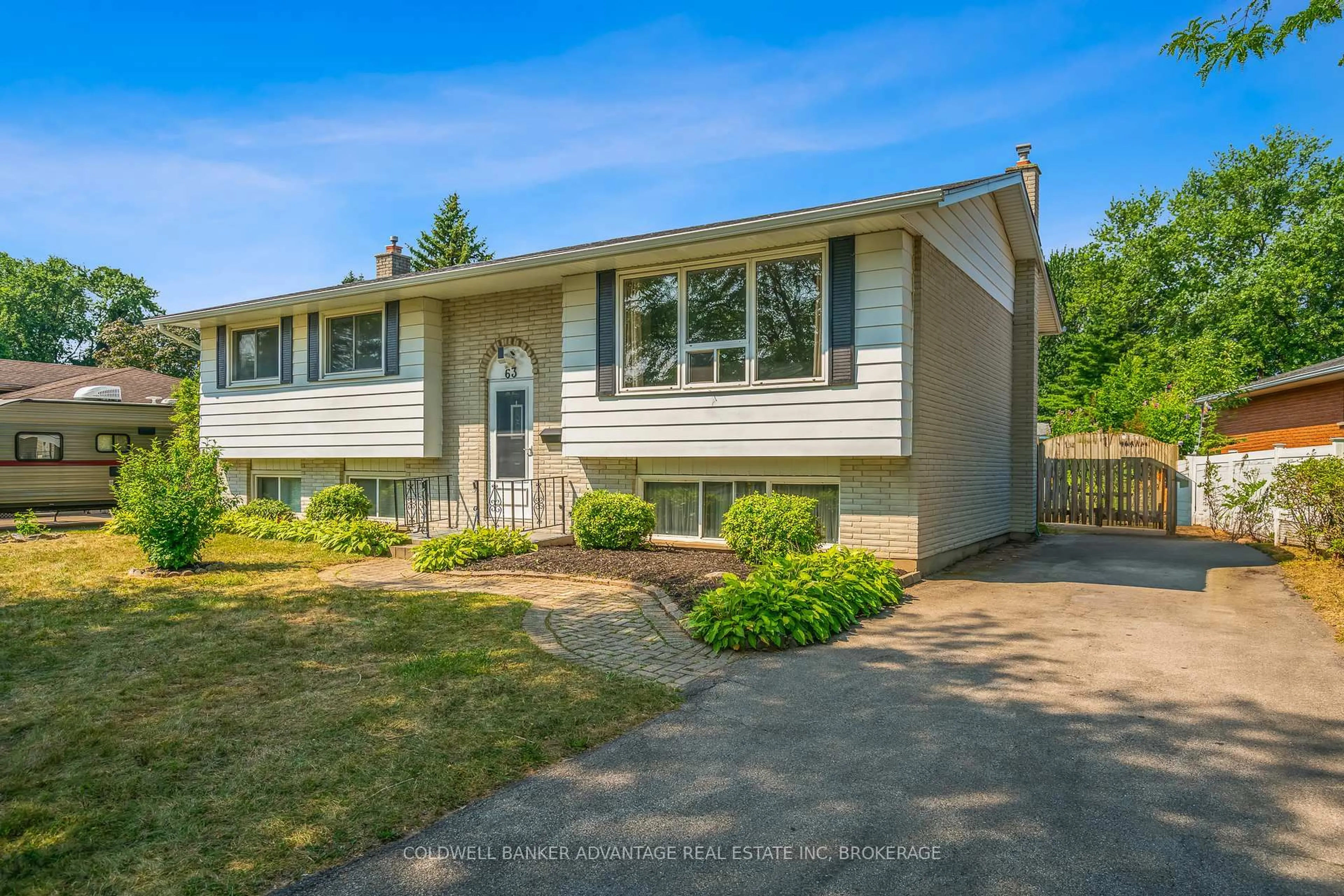 Home with vinyl exterior material, street for 63 Champlain Ave, Welland Ontario L3C 2L8