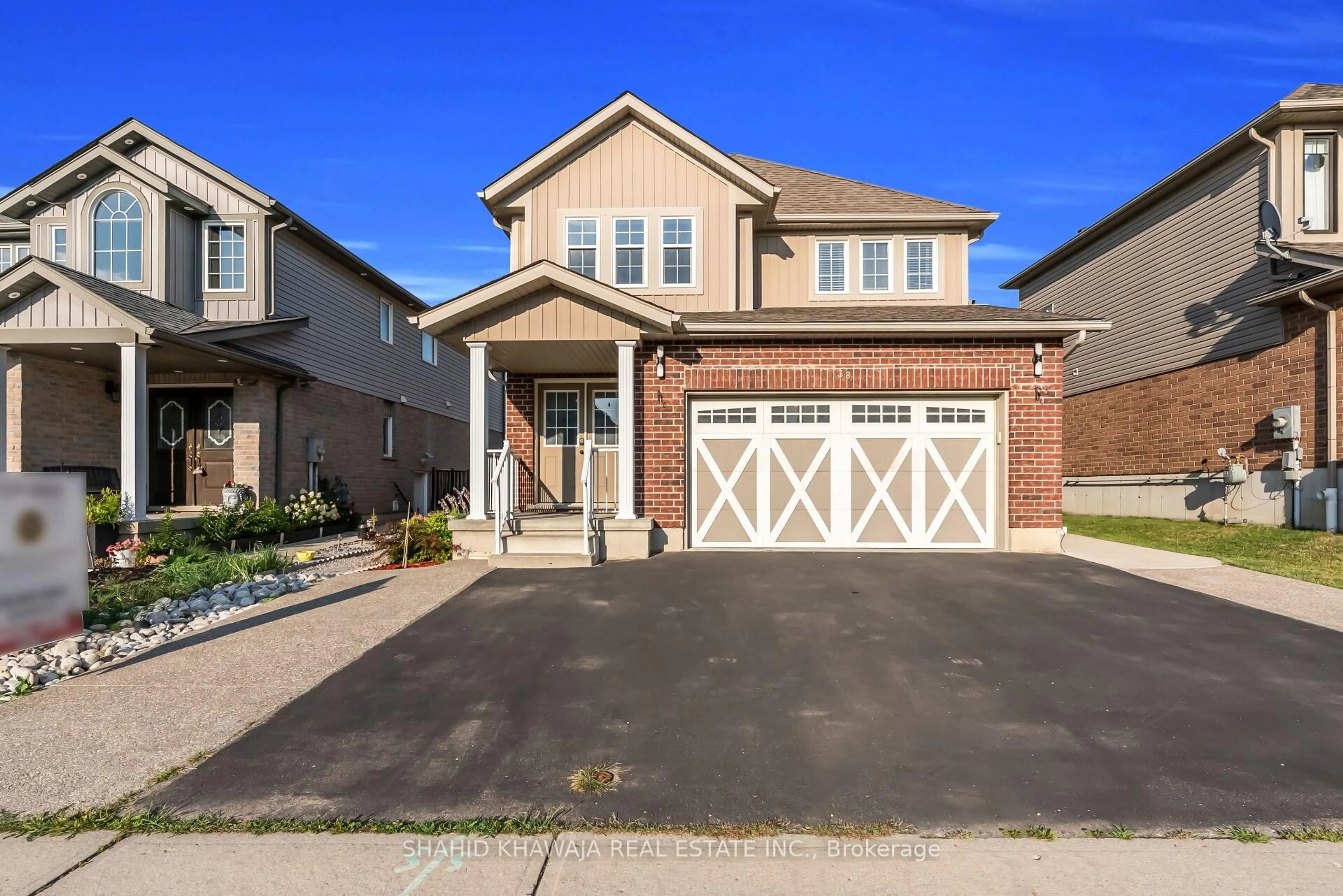 Home with brick exterior material, street for 38 Woodbine Ave, Kitchener Ontario N2R 1V9