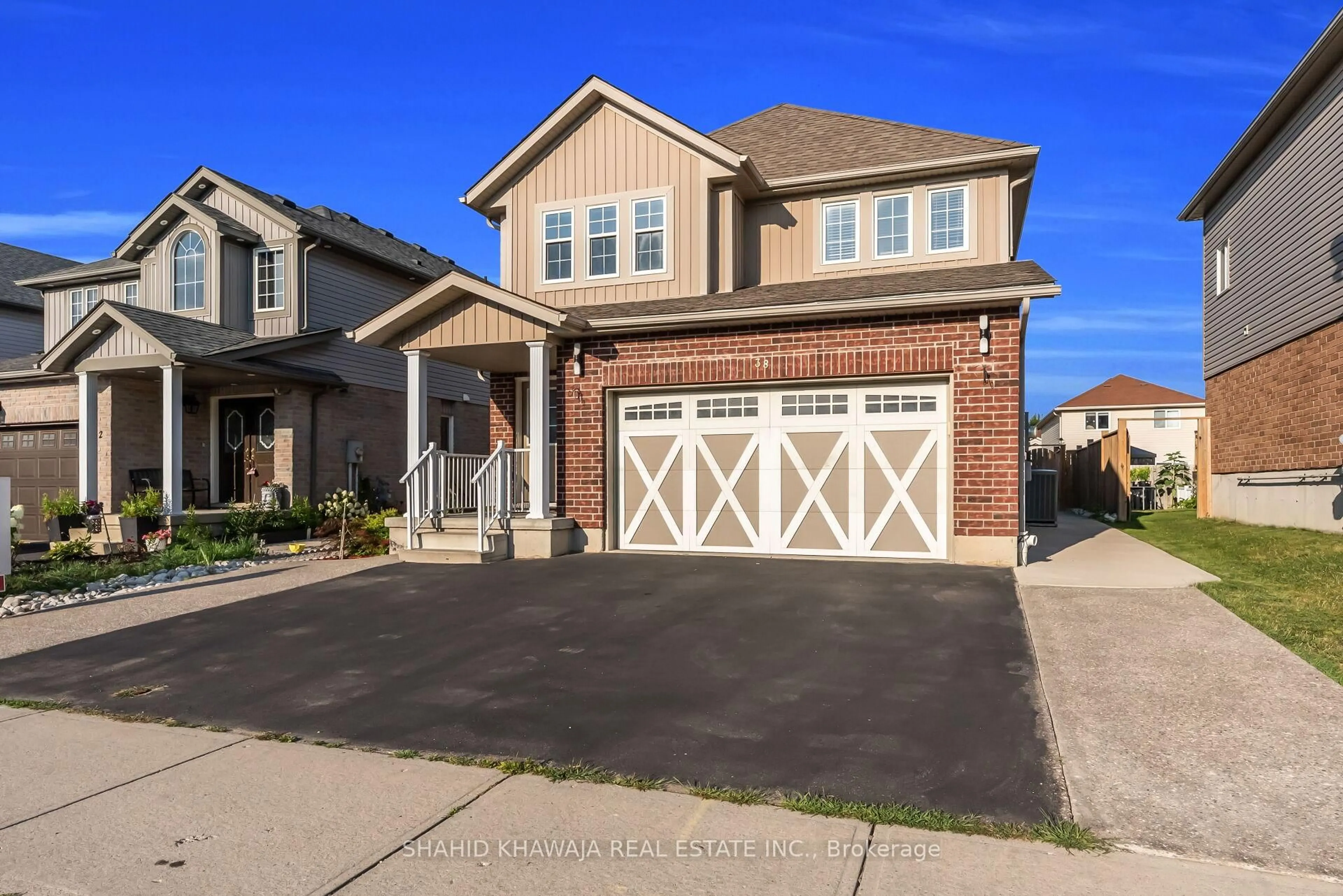 Home with brick exterior material, street for 38 Woodbine Ave, Kitchener Ontario N2R 1V9
