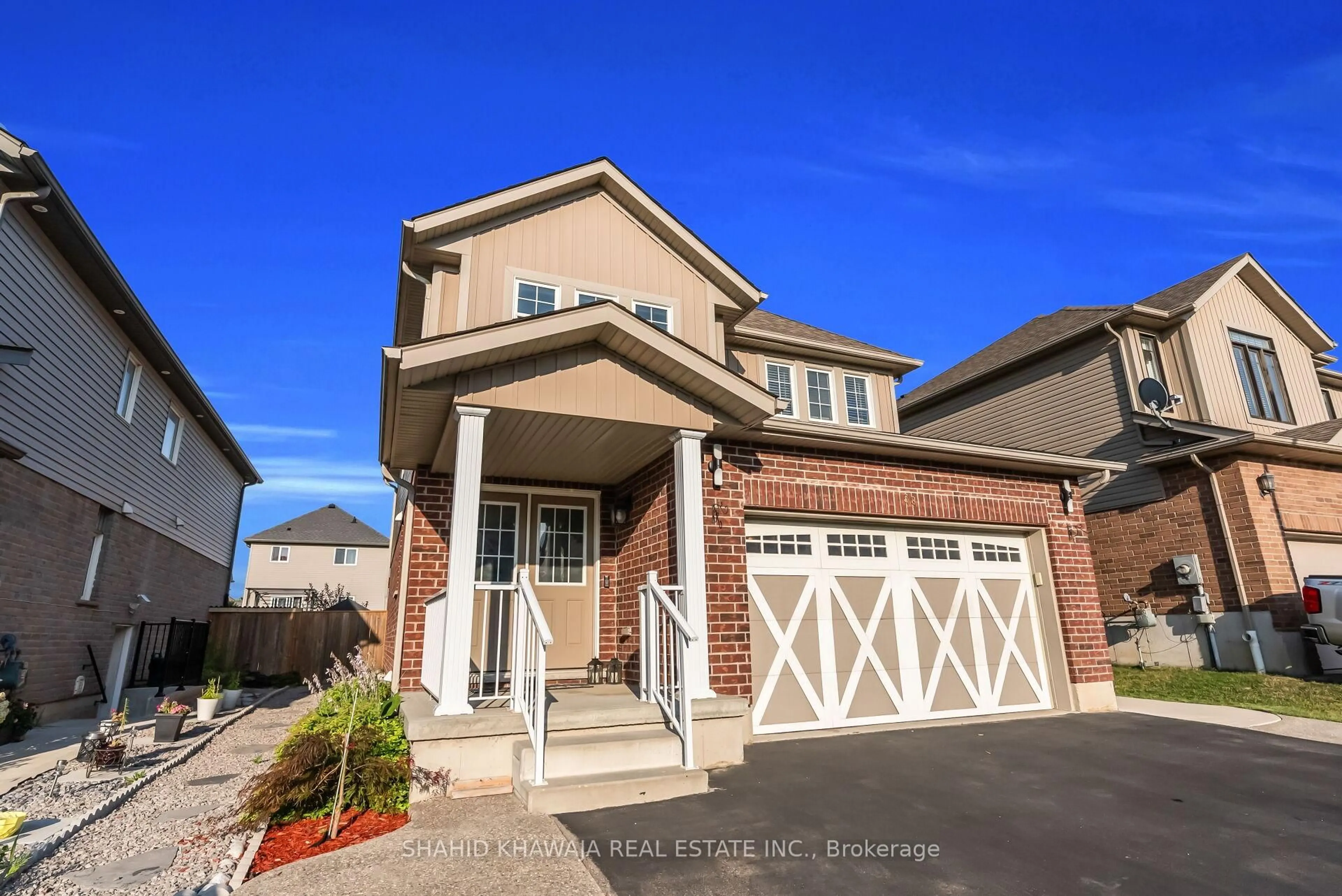 Home with brick exterior material, street for 38 Woodbine Ave, Kitchener Ontario N2R 1V9