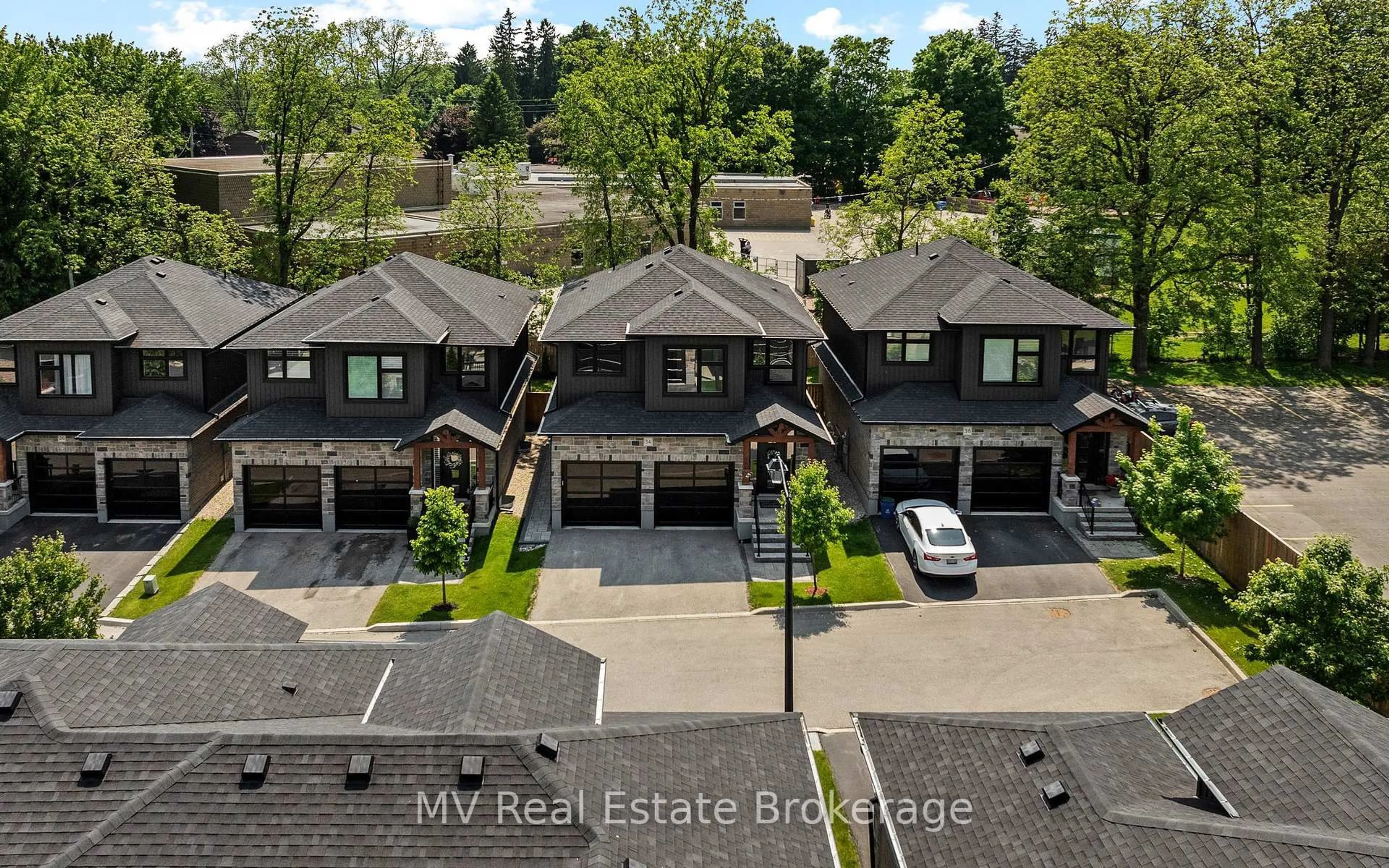 A pic from outside/outdoor area/front of a property/back of a property/a pic from drone, unknown for 34 Creekside Terrace Private, Centre Wellington Ontario N1M 0H4