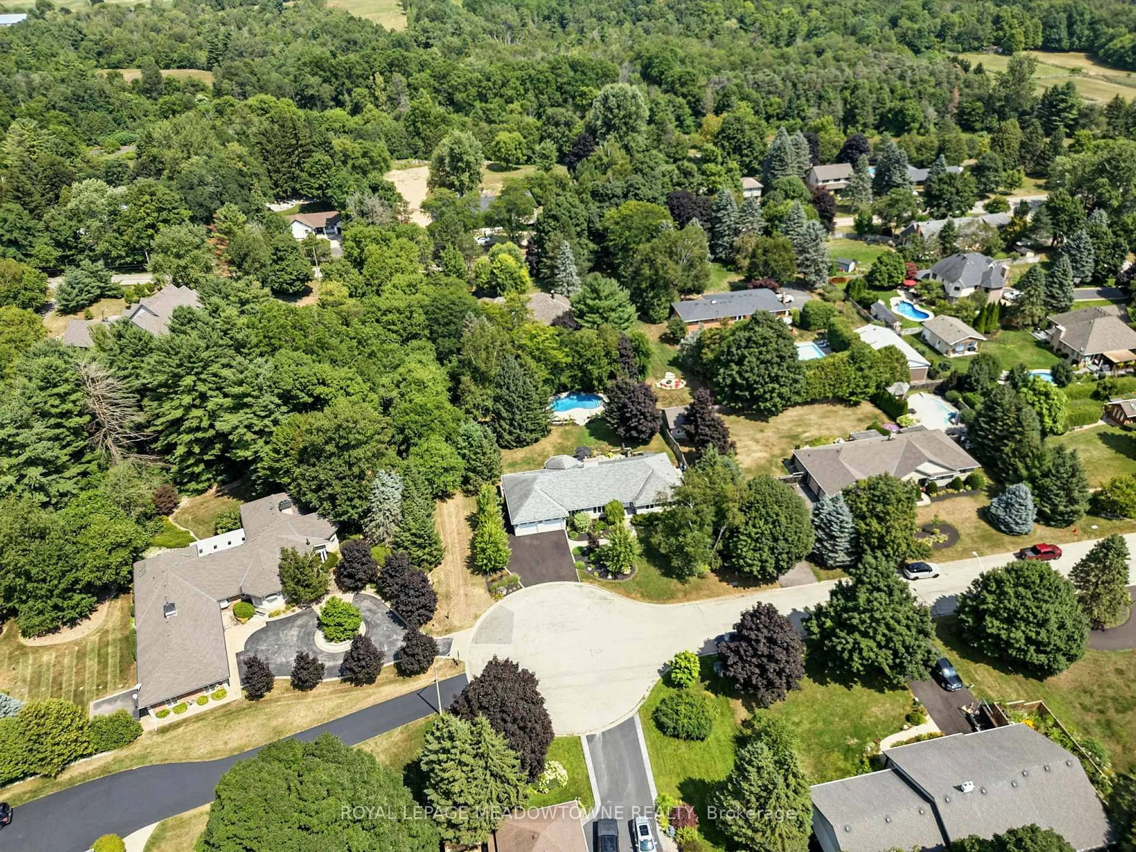 A pic from outside/outdoor area/front of a property/back of a property/a pic from drone, forest/trees view for 18 Vanstraalen St, Hamilton Ontario L0R 1H3