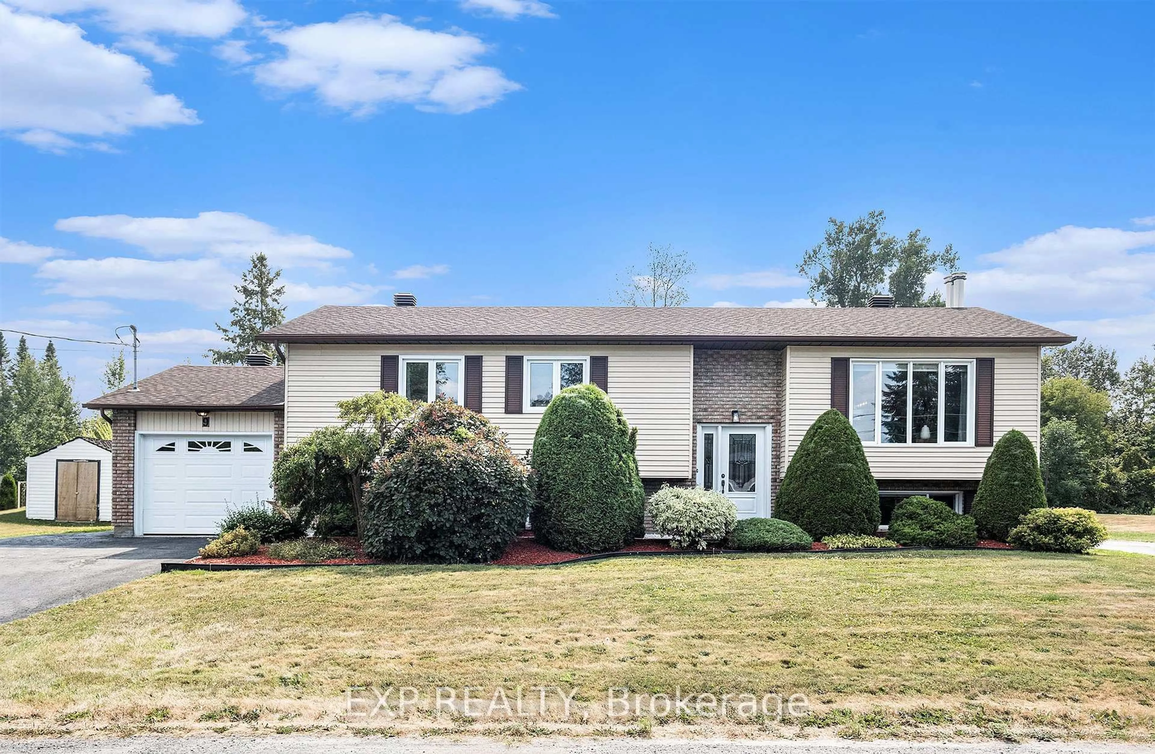 Home with vinyl exterior material, street for 9 Angele St, Russell Ontario K0A 1W0