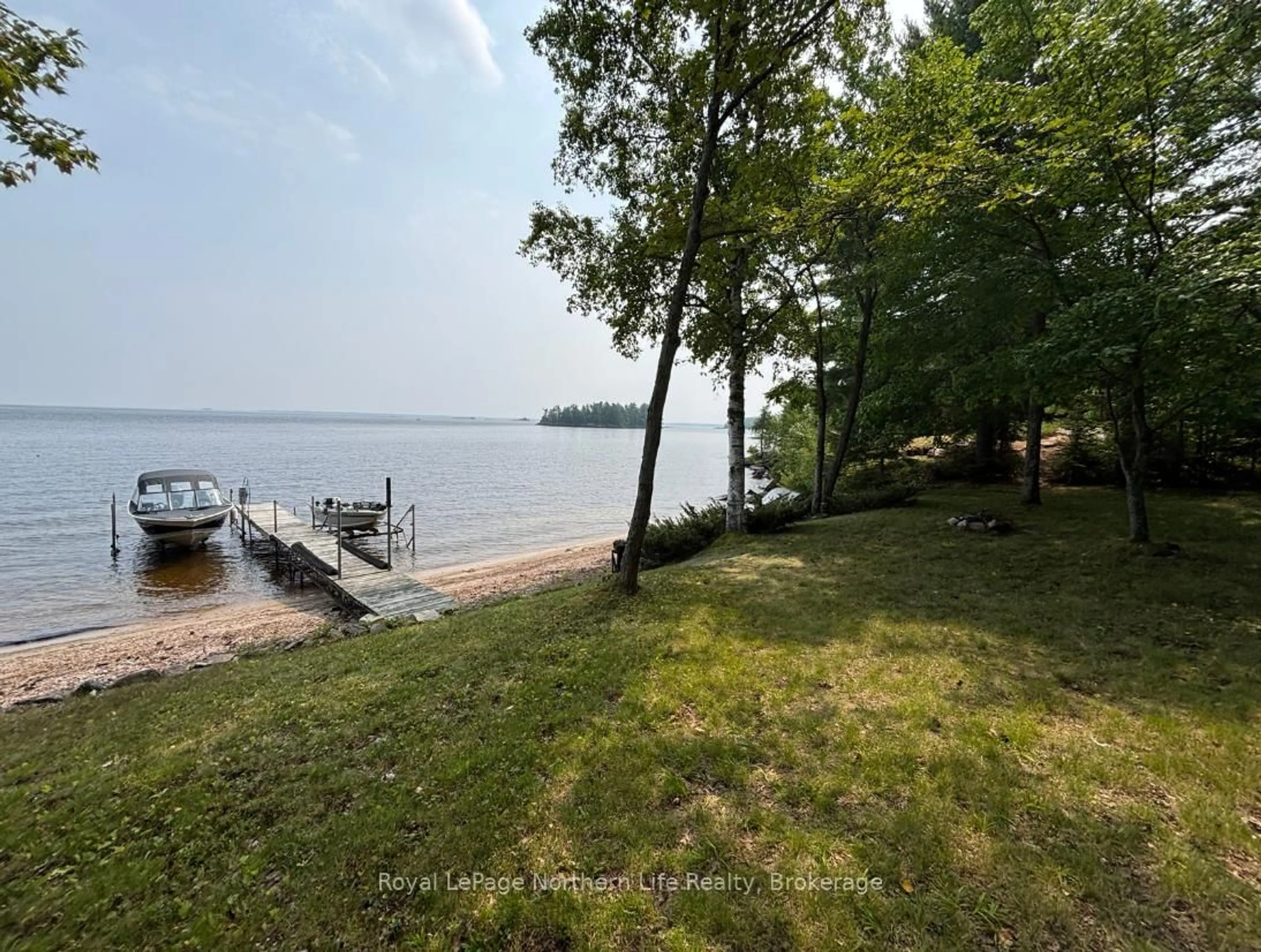 A pic from outside/outdoor area/front of a property/back of a property/a pic from drone, water/lake/river/ocean view for 16 Muskie Bay Lake Nipissing, Nipissing Ontario P0H 1W0
