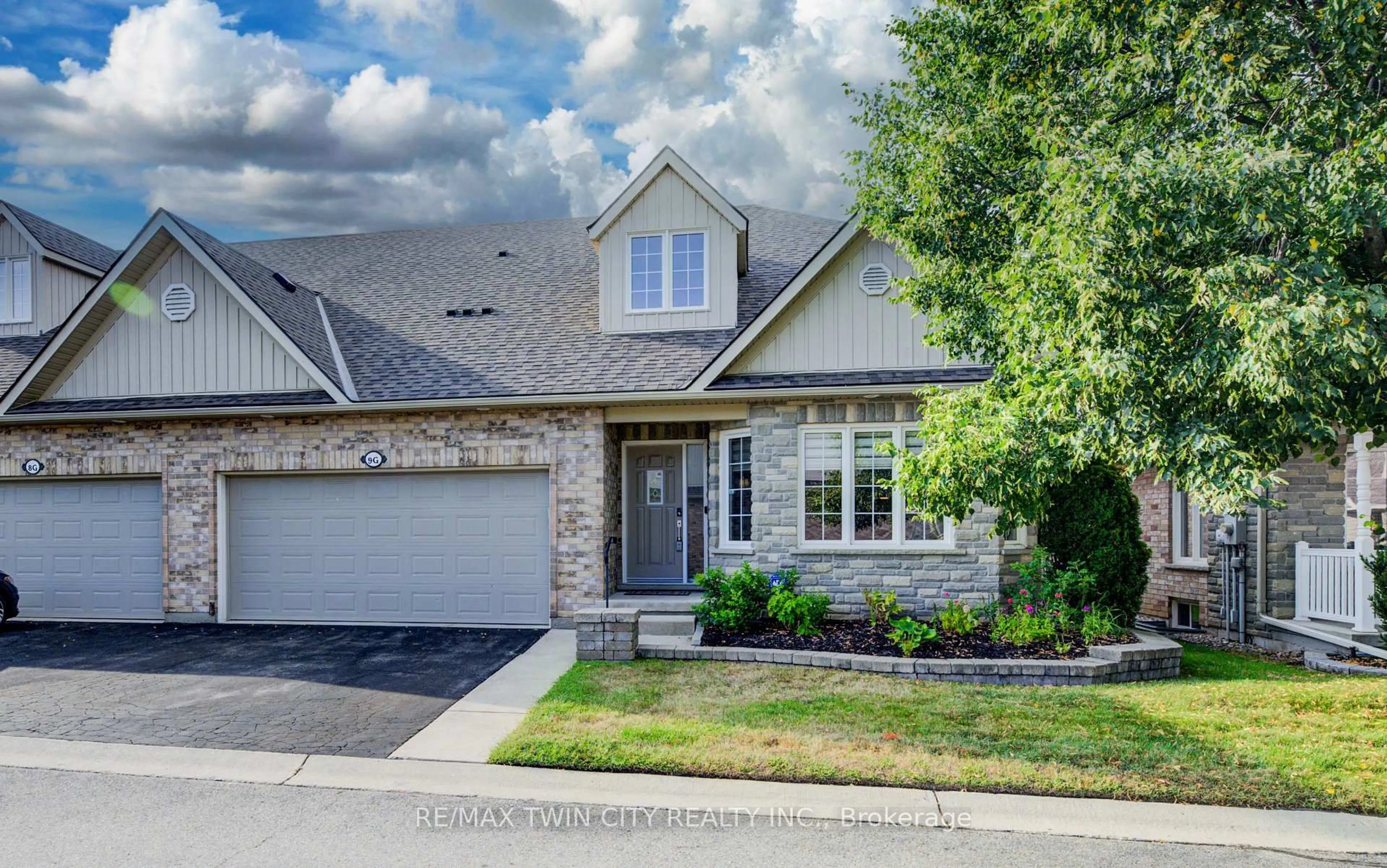 Home with brick exterior material, street for 350 Doon Valley Dr #9G, Kitchener Ontario N2P 2M9
