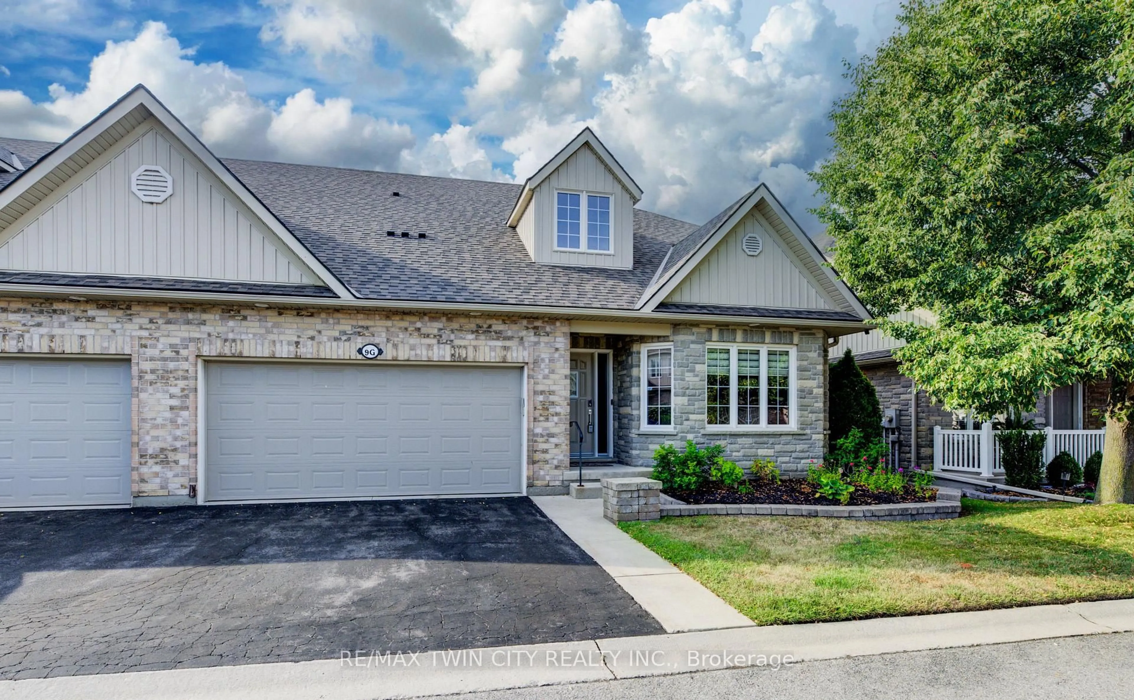 Home with brick exterior material, street for 350 Doon Valley Dr #9G, Kitchener Ontario N2P 2M9