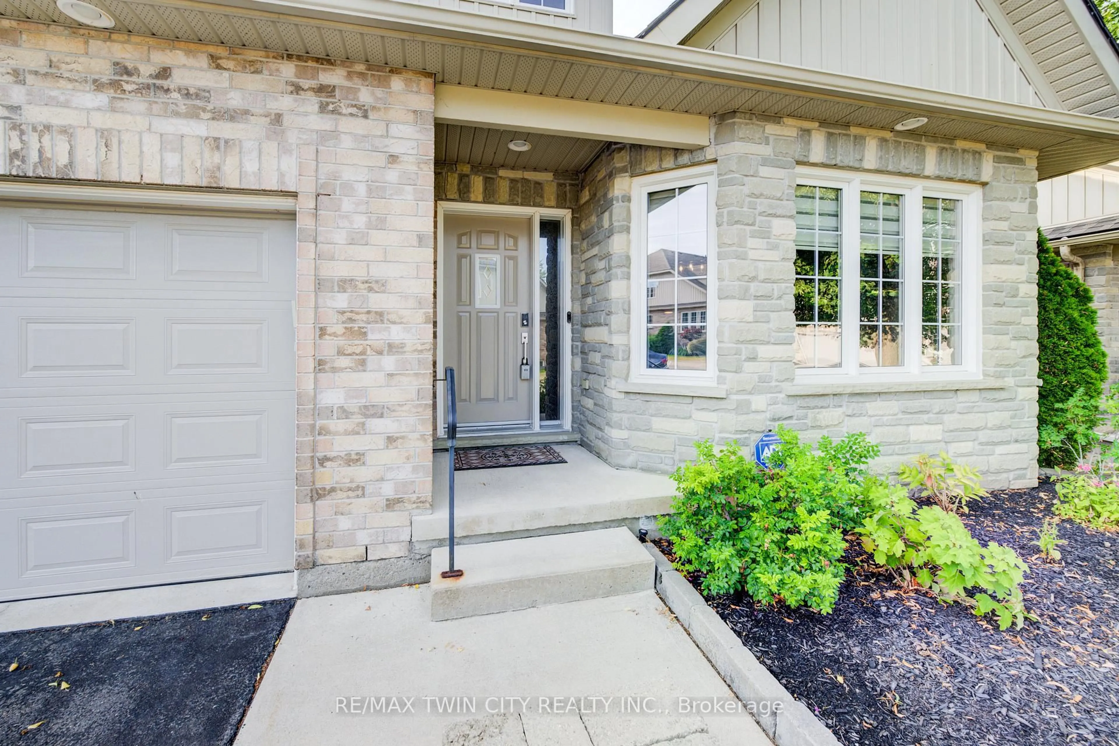 Home with brick exterior material, street for 350 Doon Valley Dr #9G, Kitchener Ontario N2P 2M9