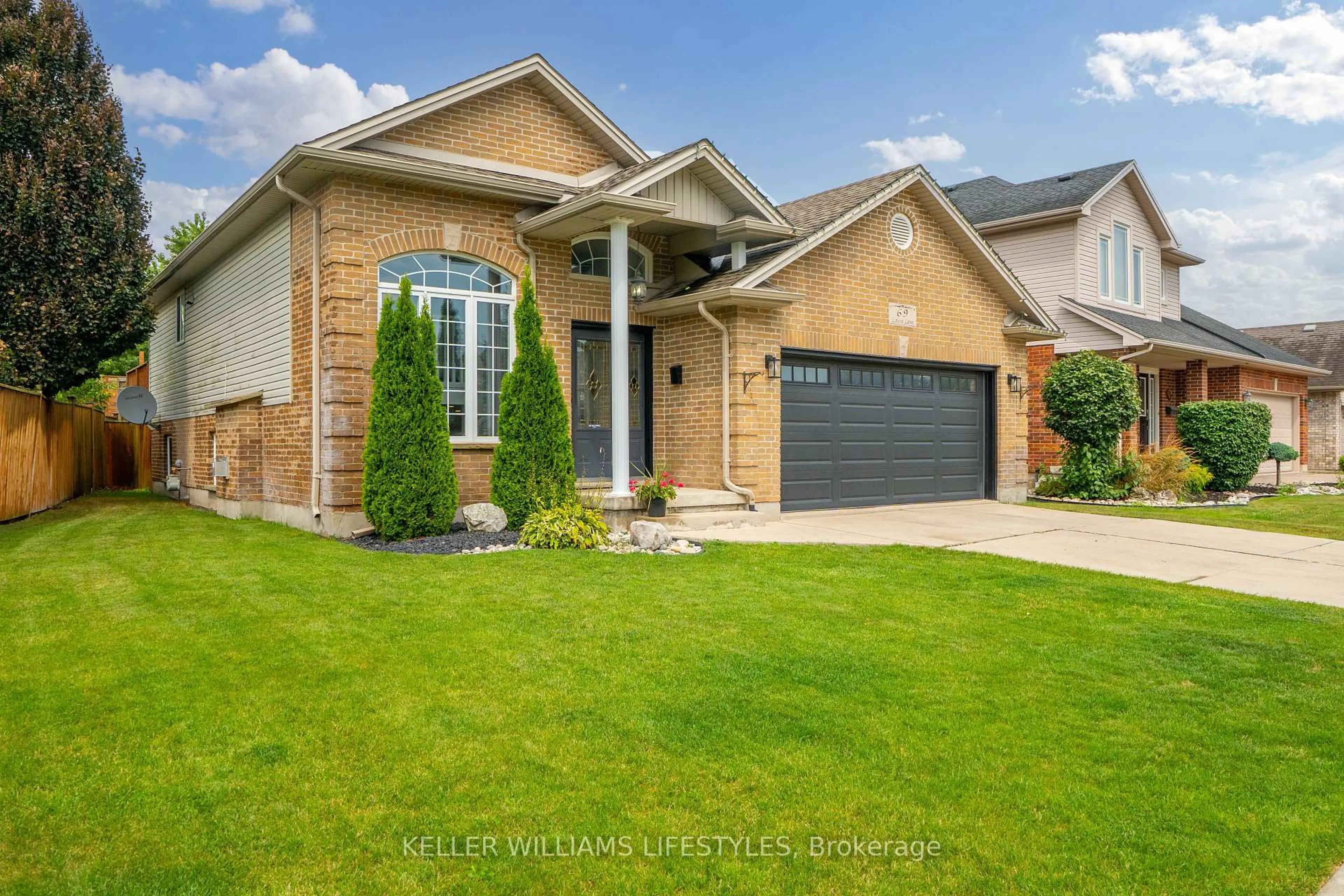 Home with brick exterior material, street for 69 Laura Lane, Strathroy-Caradoc Ontario N7G 4K9