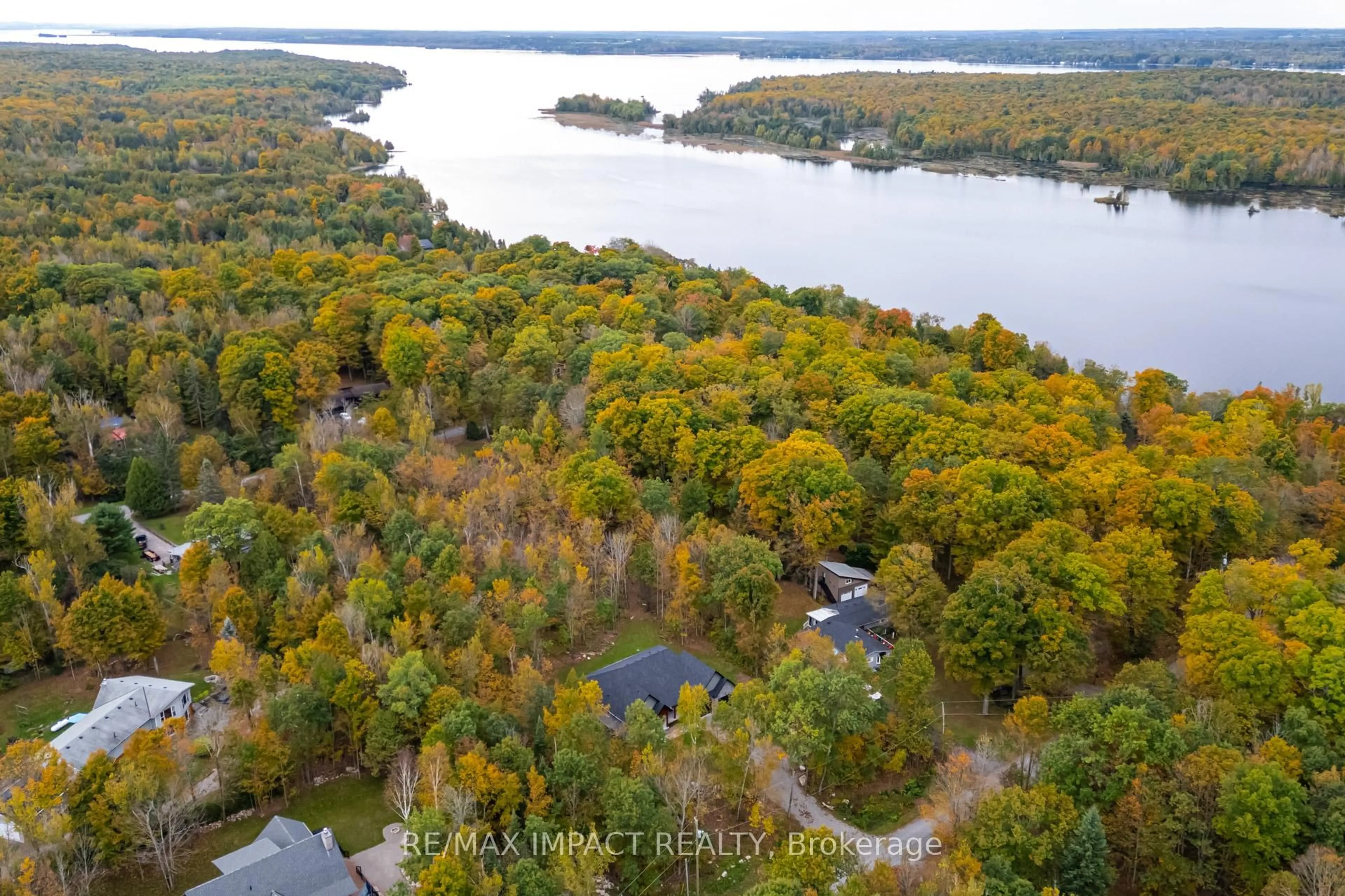 A pic from outside/outdoor area/front of a property/back of a property/a pic from drone, water/lake/river/ocean view for 11 Maplewood Crt, Trent Lakes Ontario K0L 1J0
