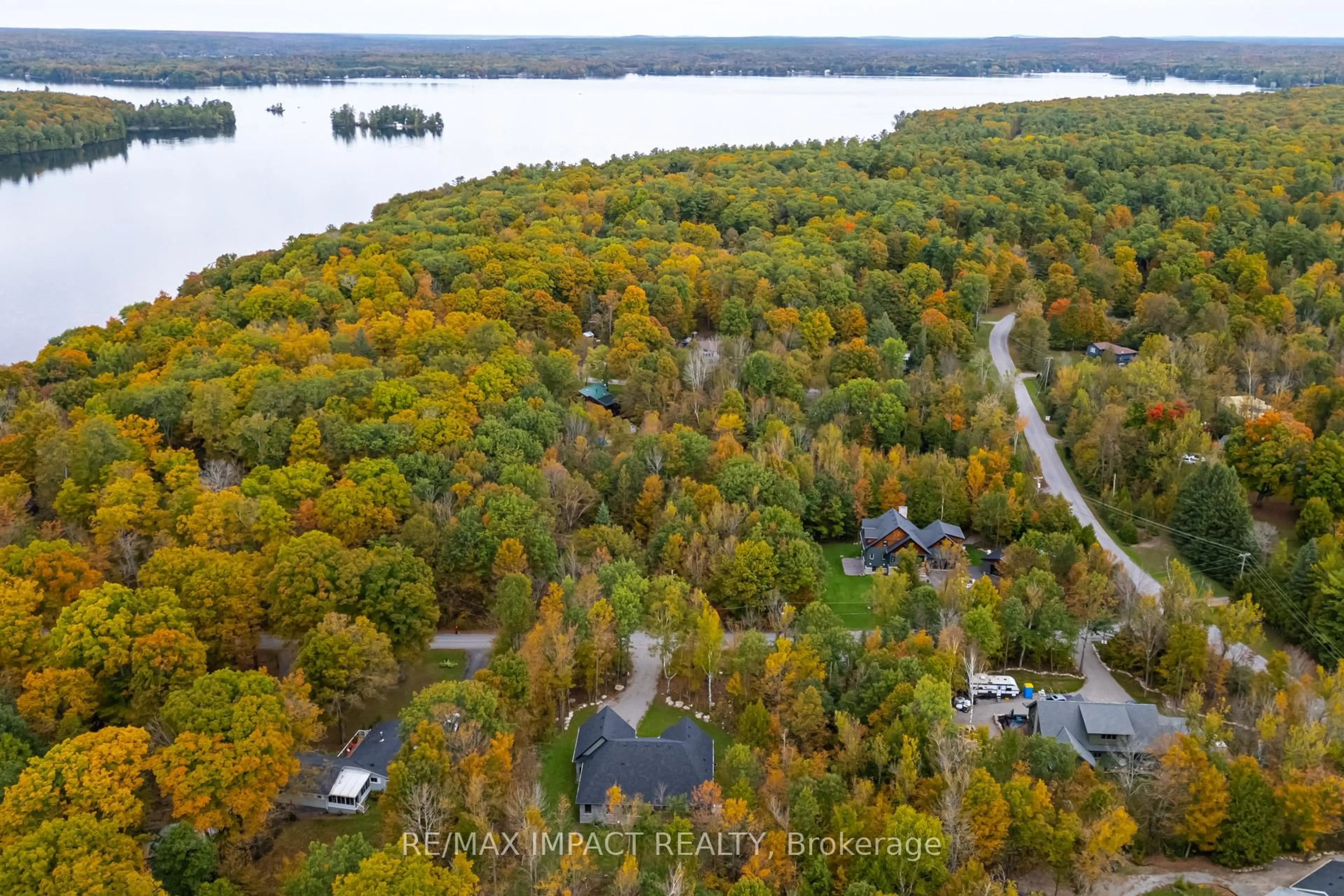 A pic from outside/outdoor area/front of a property/back of a property/a pic from drone, water/lake/river/ocean view for 11 Maplewood Crt, Trent Lakes Ontario K0L 1J0