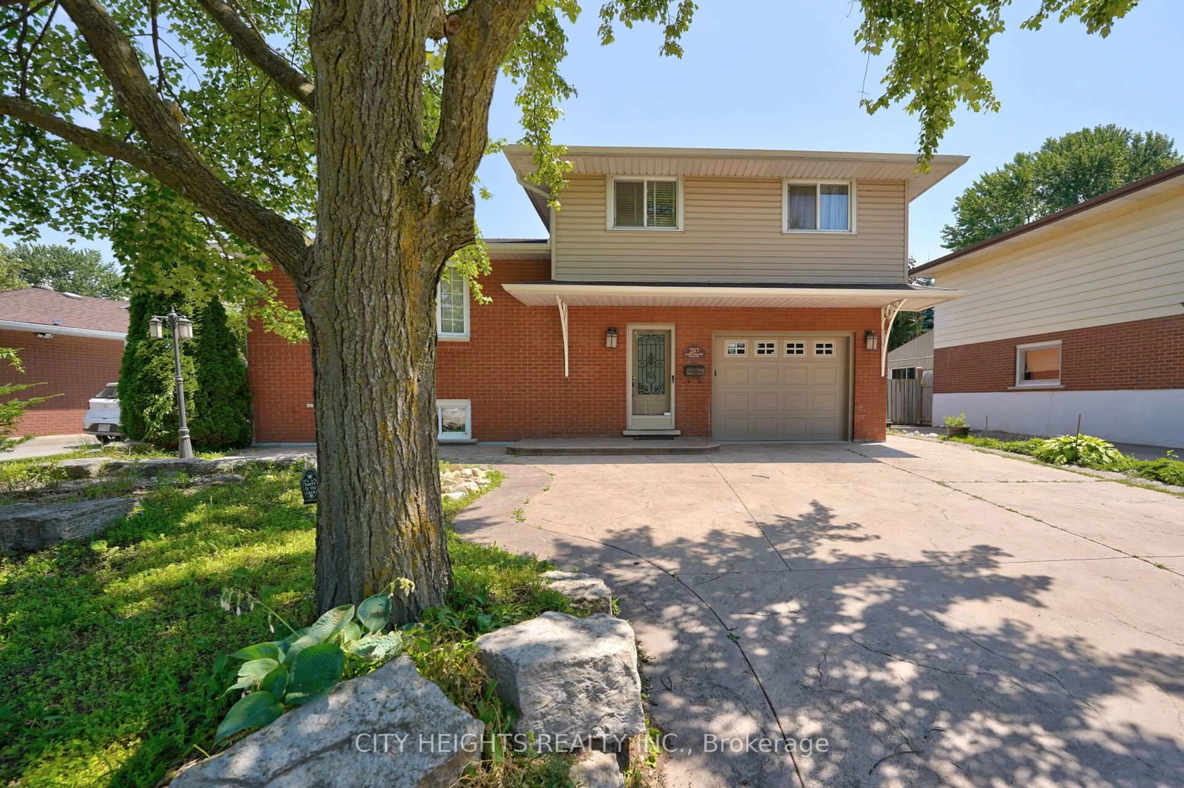 Home with brick exterior material, street for 207 Christopher Dr, Cambridge Ontario N1R 4S6