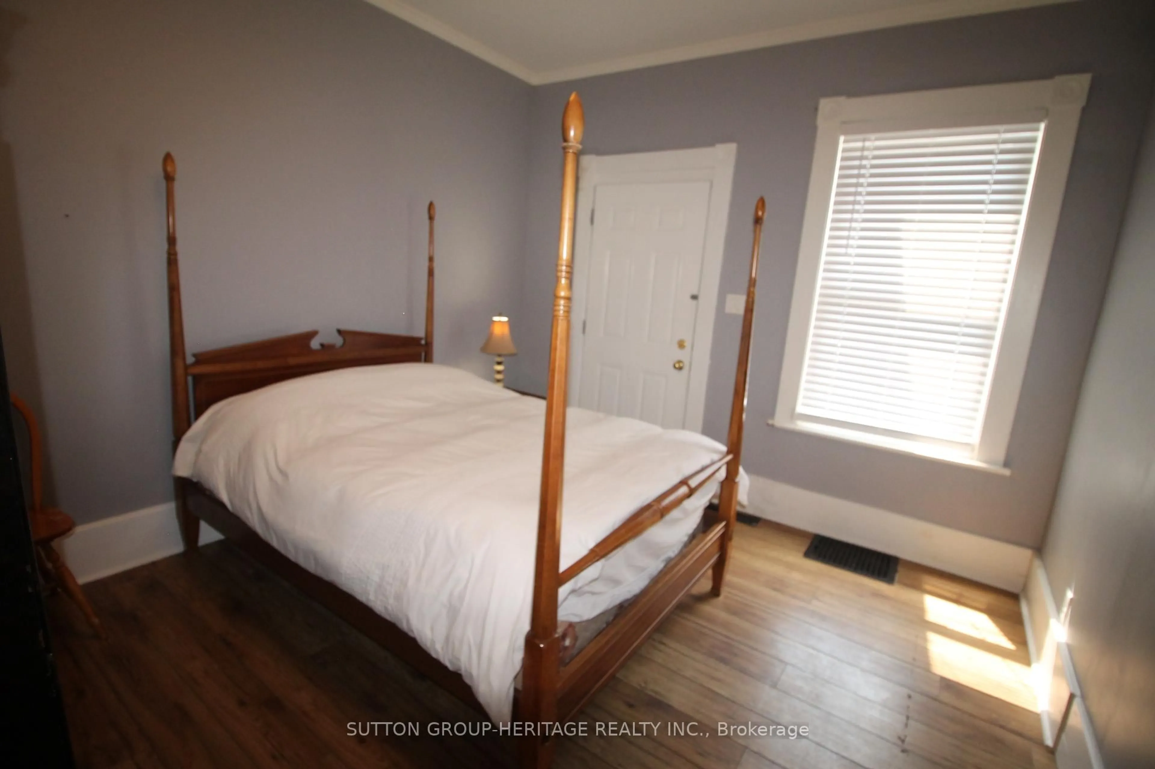 Bedroom with bed, wood/laminate floor for 260 Stewart St, Peterborough Central Ontario K9J 3M9