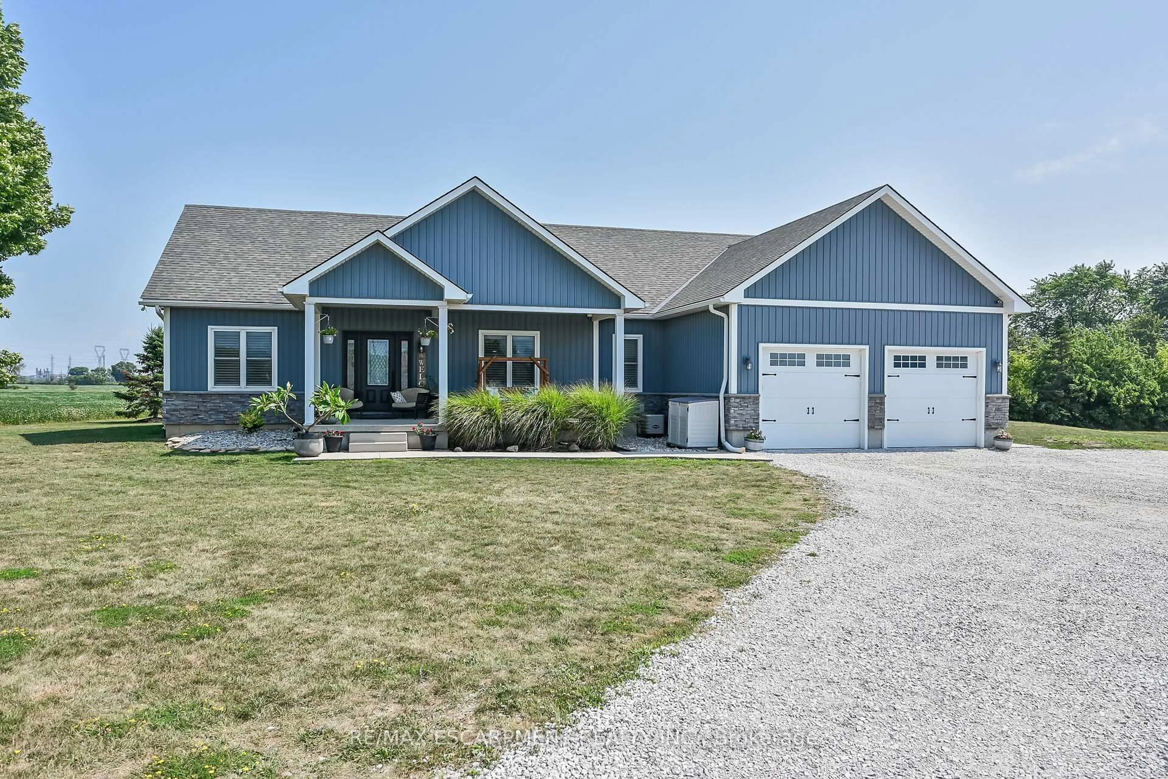 Home with vinyl exterior material, street for 236 #55 HALDIMAND Rd, Haldimand Ontario N0A 1L0