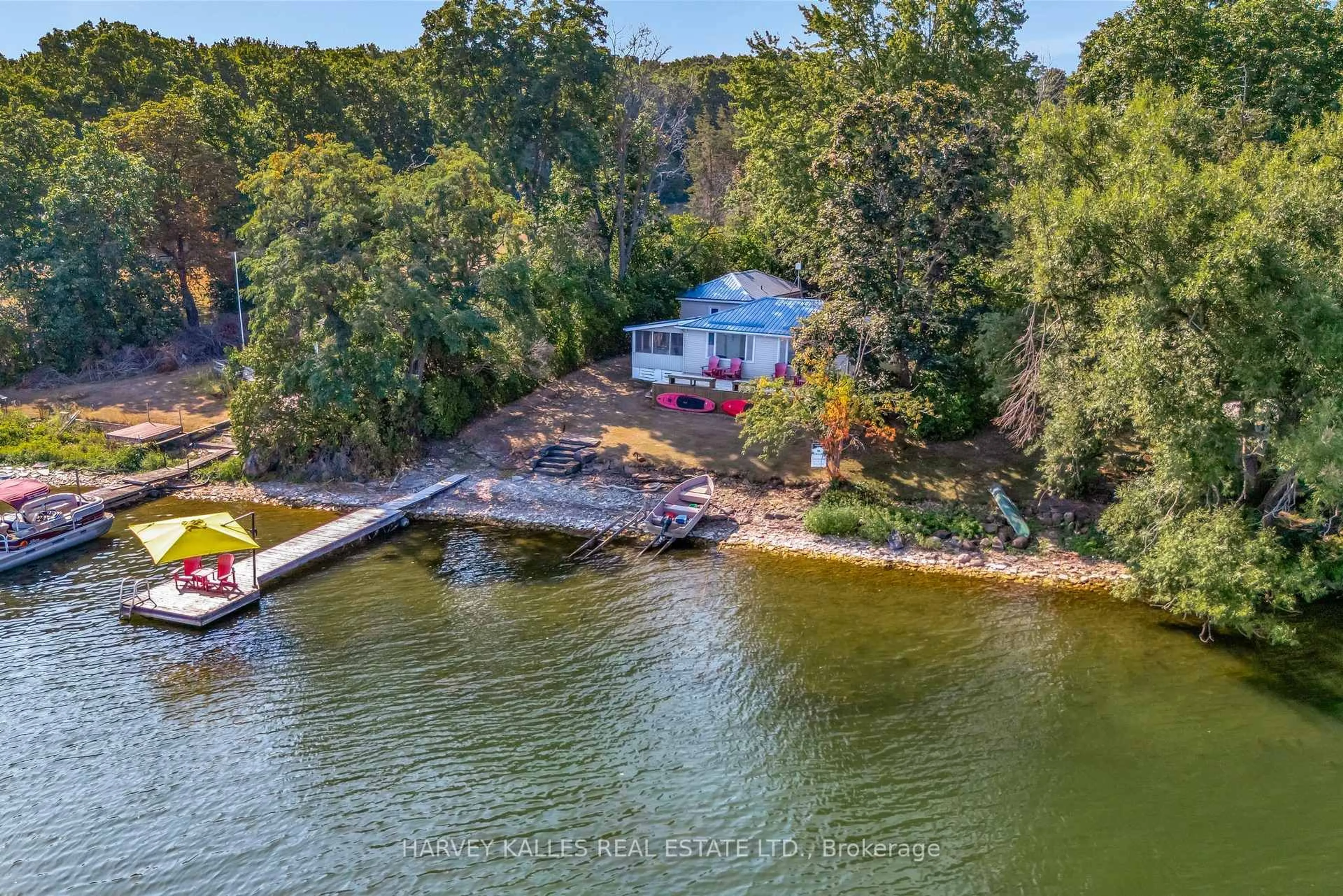 A pic from outside/outdoor area/front of a property/back of a property/a pic from drone, water/lake/river/ocean view for 11856B Loyalist Pkwy, Prince Edward County Ontario K0K 2T0