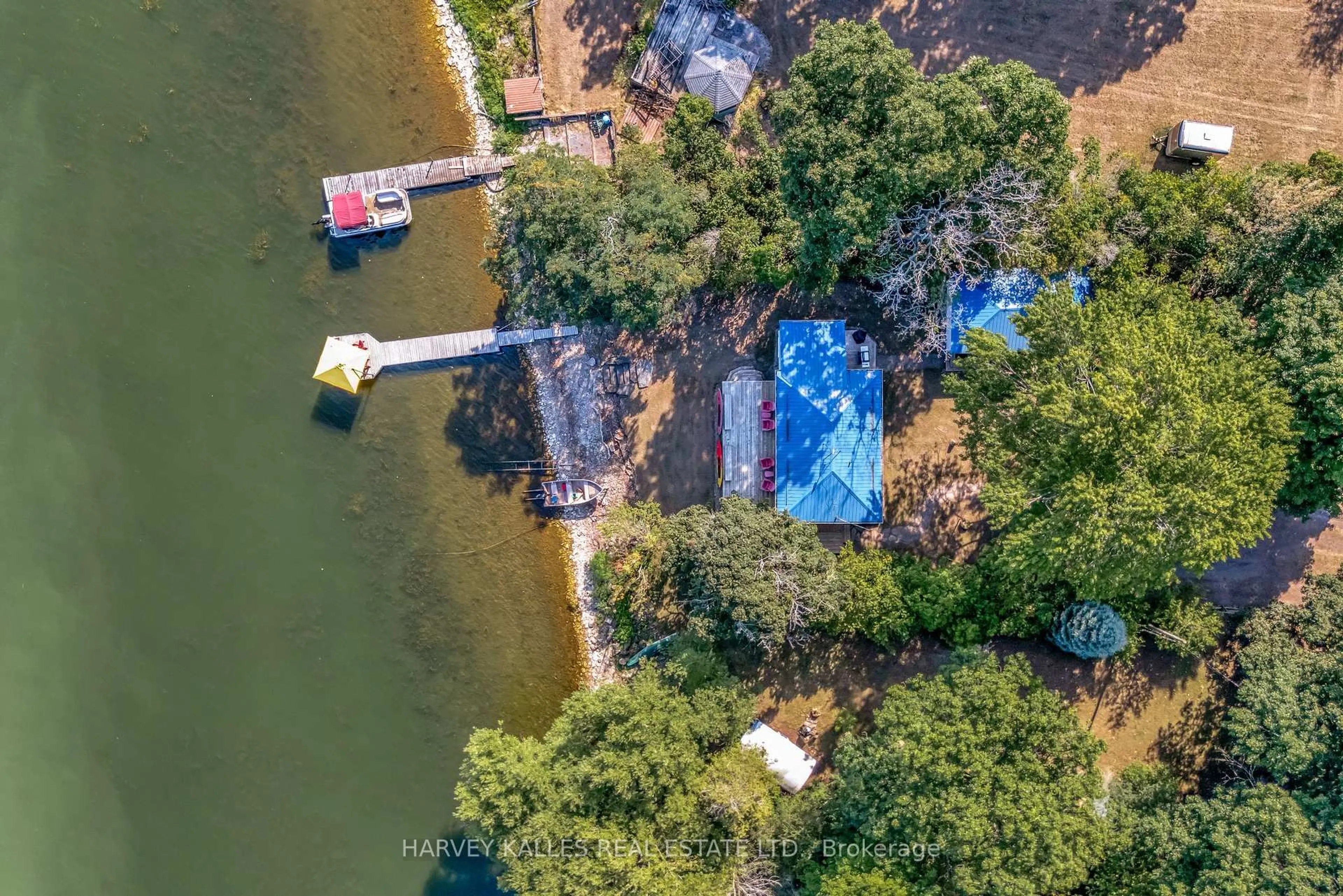 A pic from outside/outdoor area/front of a property/back of a property/a pic from drone, water/lake/river/ocean view for 11856B Loyalist Pkwy, Prince Edward County Ontario K0K 2T0