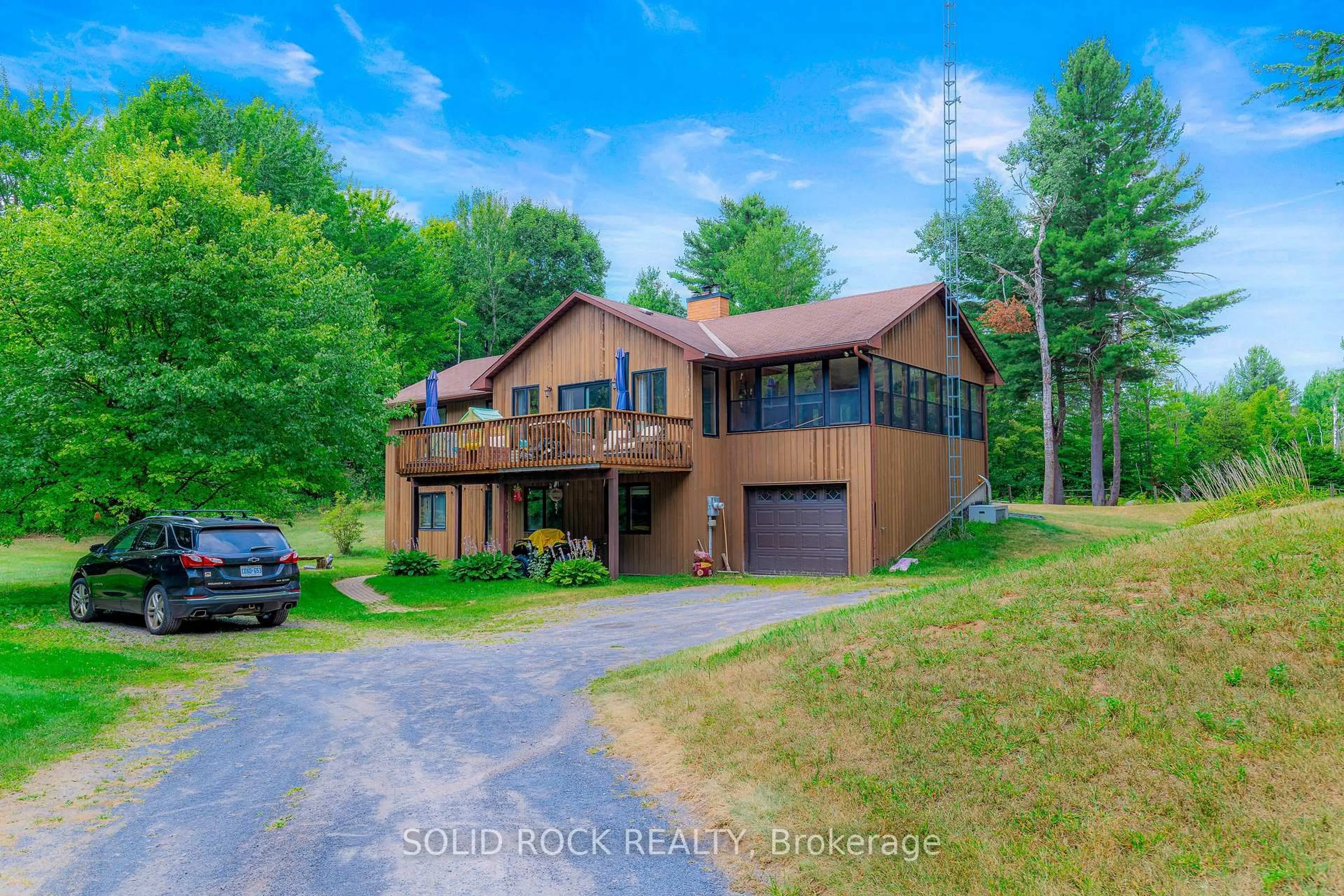 A pic from outside/outdoor area/front of a property/back of a property/a pic from drone, water/lake/river/ocean view for 2063 Totem Ranch Rd, North Grenville Ontario K0G 1T0