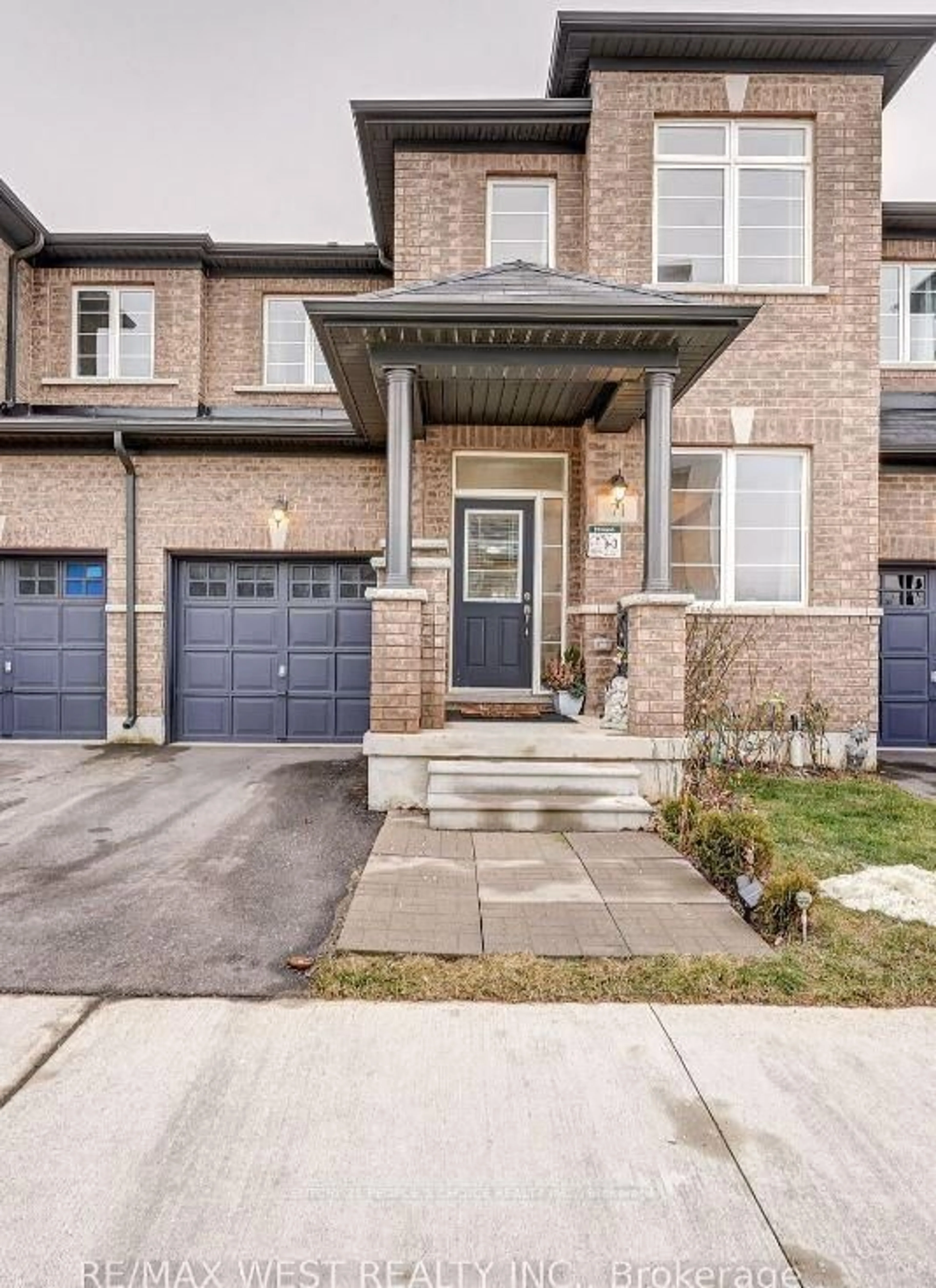 Home with brick exterior material, street for 71 Riverwalk Dr, Hamilton Ontario L0R 2H1