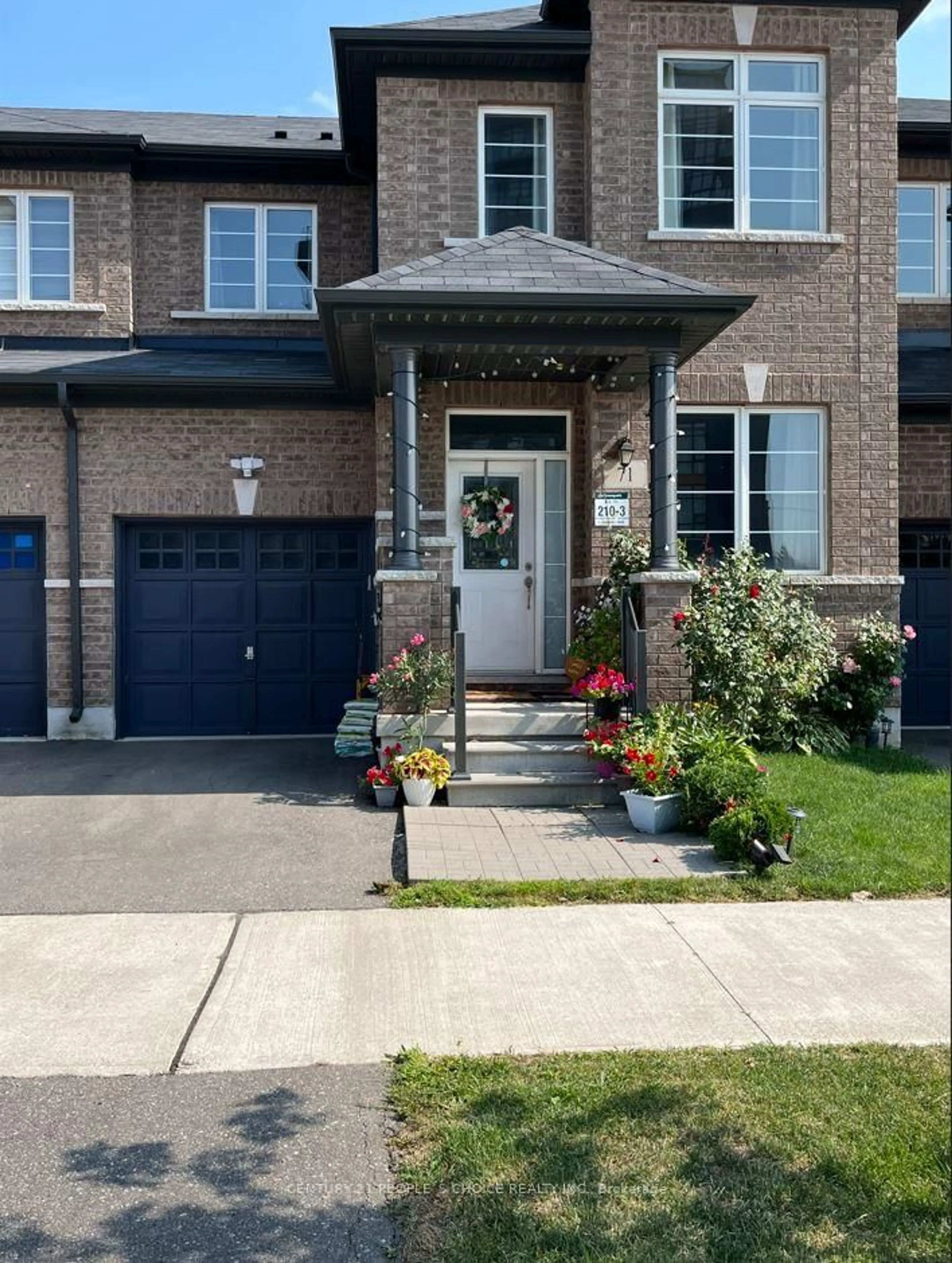 Home with brick exterior material, street for 71 Riverwalk Dr, Hamilton Ontario L0R 2H1