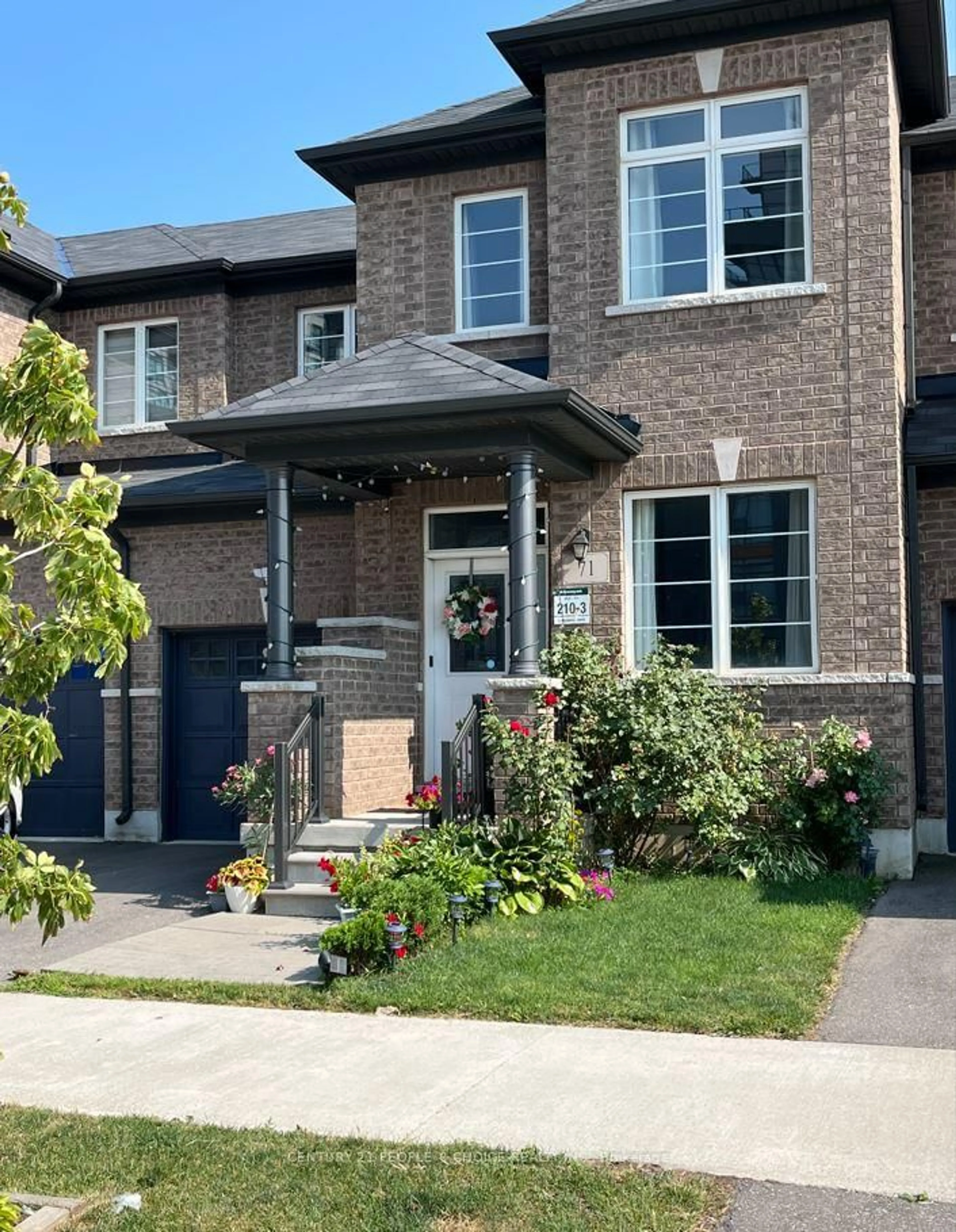 Home with brick exterior material, street for 71 Riverwalk Dr, Hamilton Ontario L0R 2H1