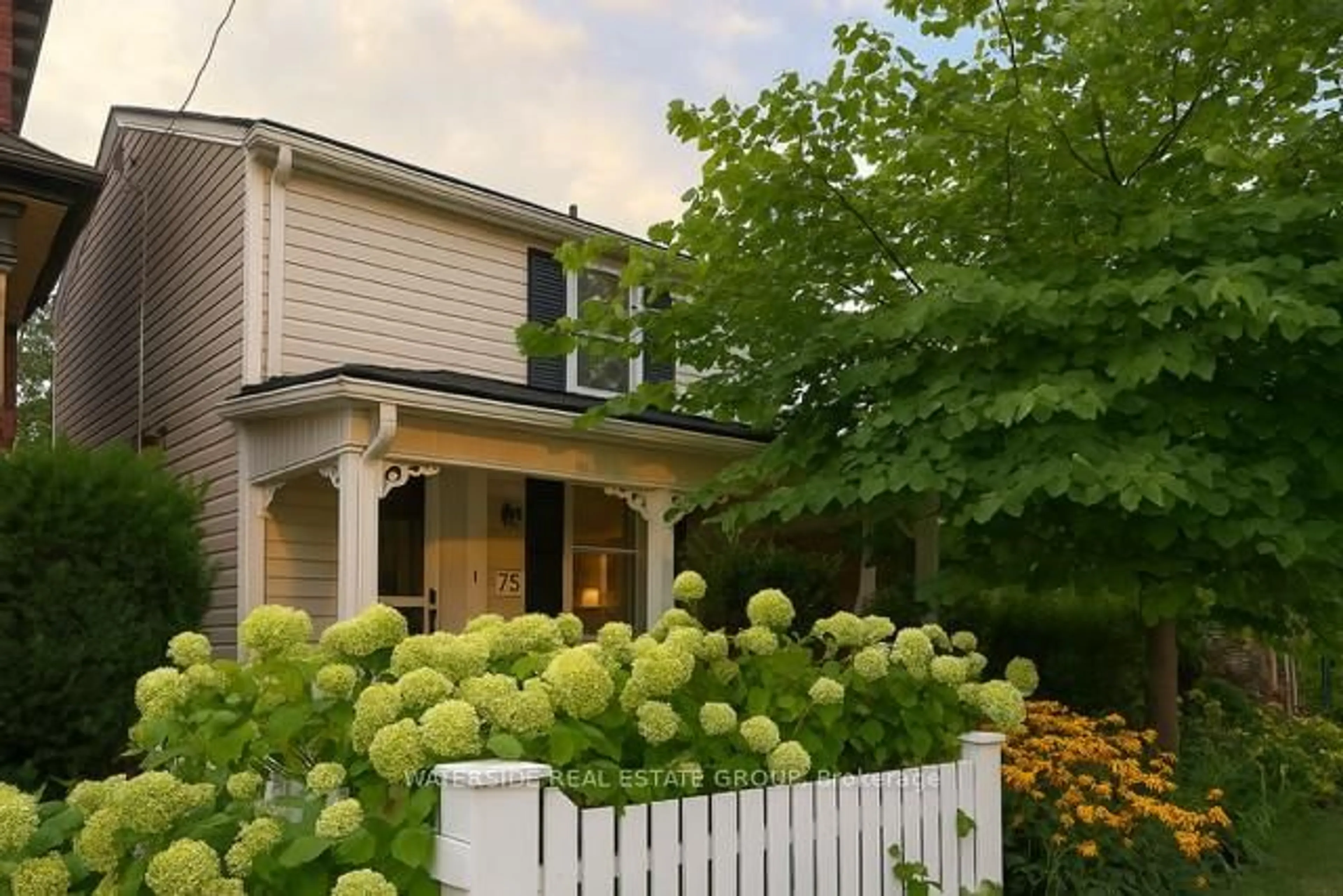 Home with vinyl exterior material, street for 75 Ray St, Hamilton Ontario L8R 2X7