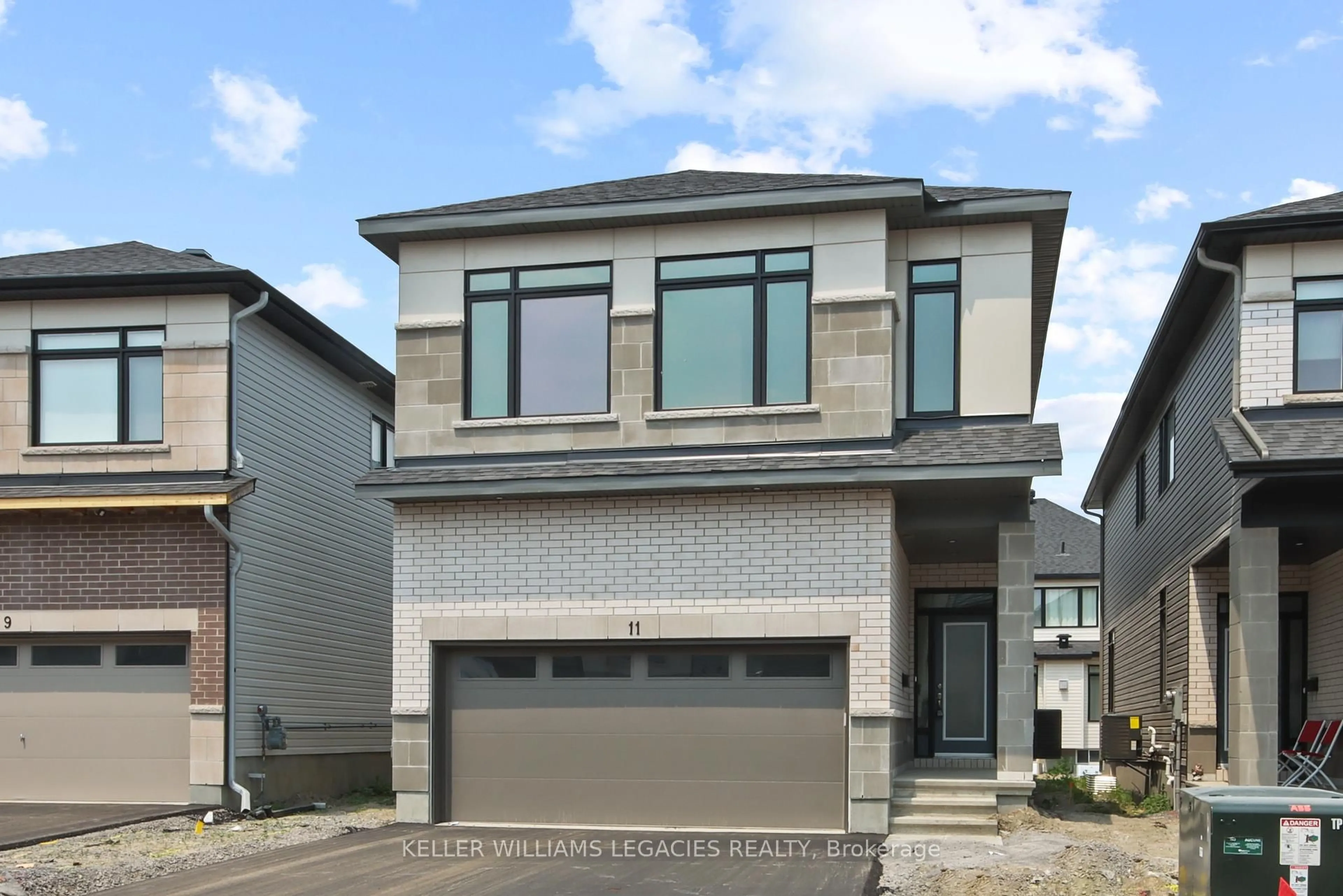 Home with brick exterior material, street for 11 Mendoza Way, Ottawa Ontario K2S 1B6