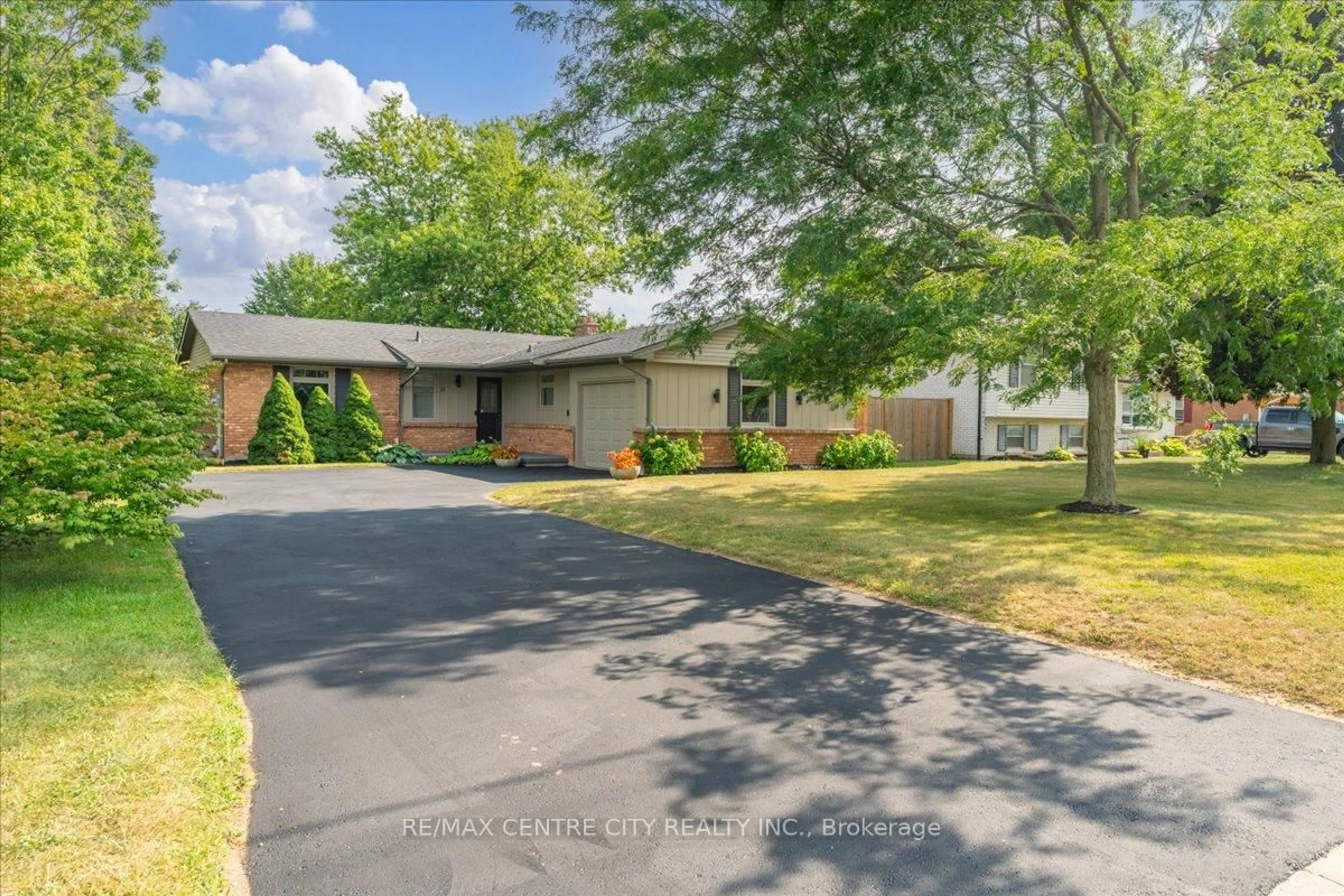 A pic from outside/outdoor area/front of a property/back of a property/a pic from drone, street for 11 Southland Dr, London South Ontario N6P 1C2