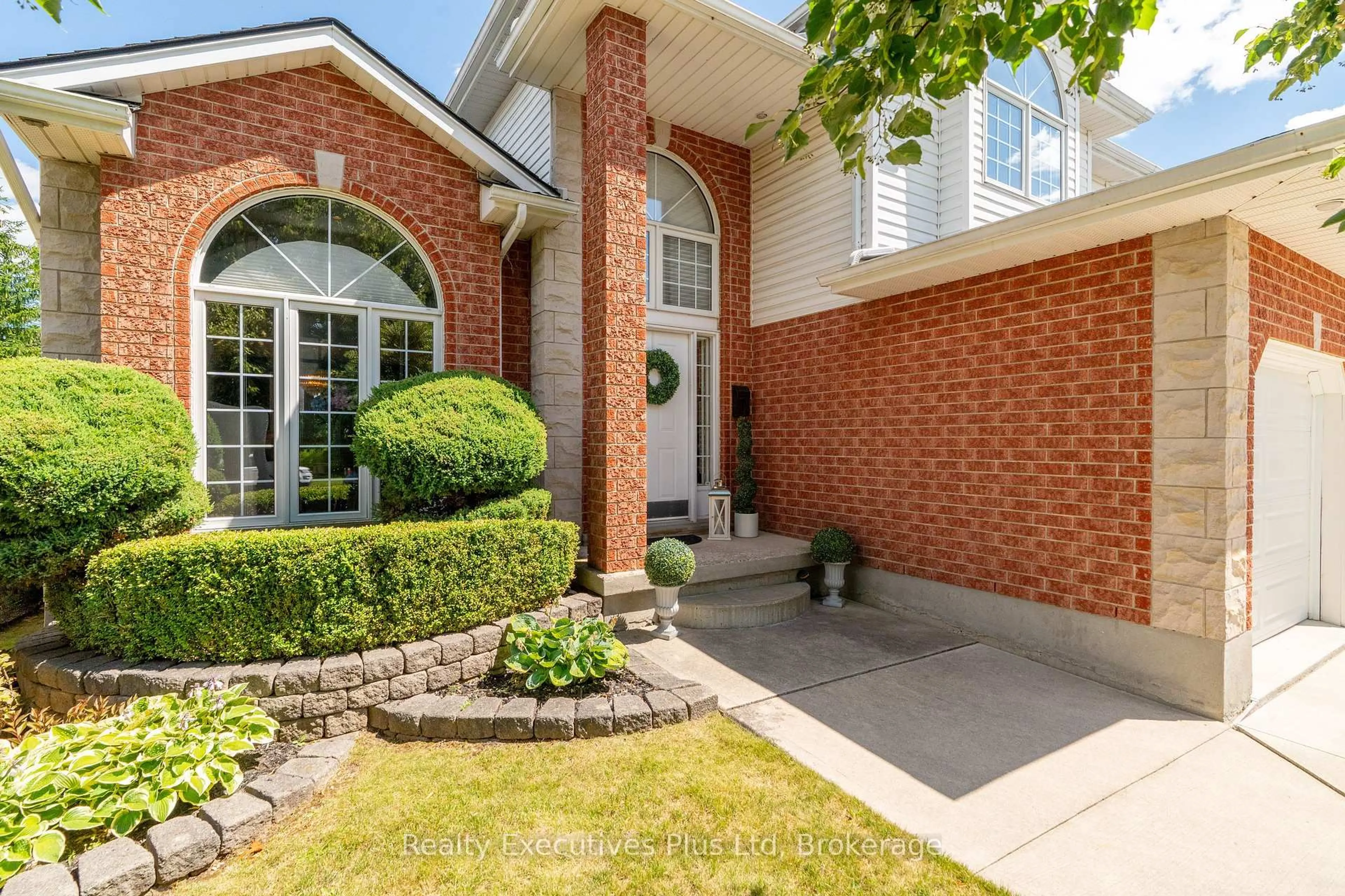 Home with brick exterior material, street for 45 Fieldstone Rd, Guelph Ontario N1L 1B4