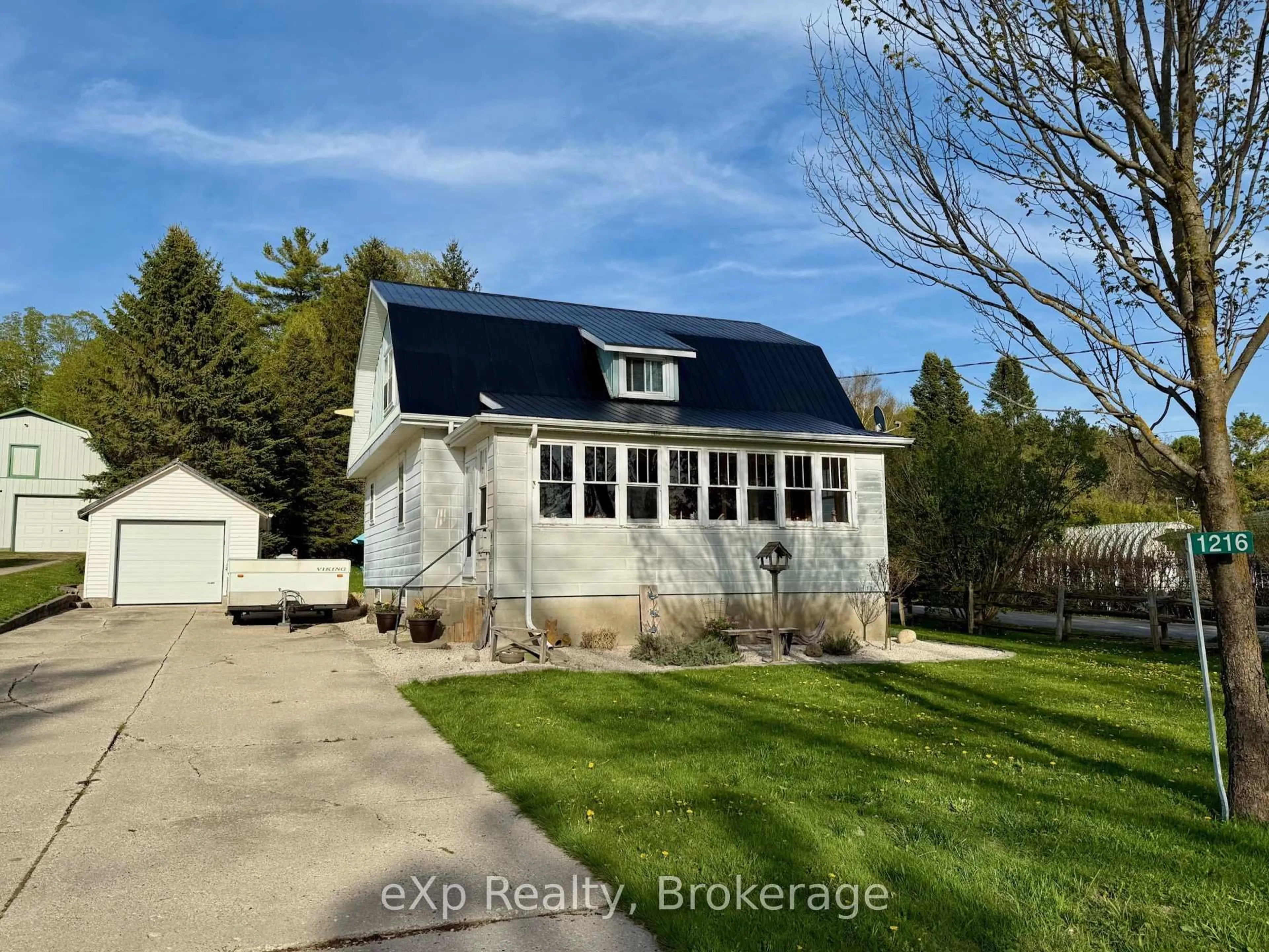 A pic from outside/outdoor area/front of a property/back of a property/a pic from drone, unknown for 1216 Bruce Road 12, South Bruce Ontario N0G 1W0