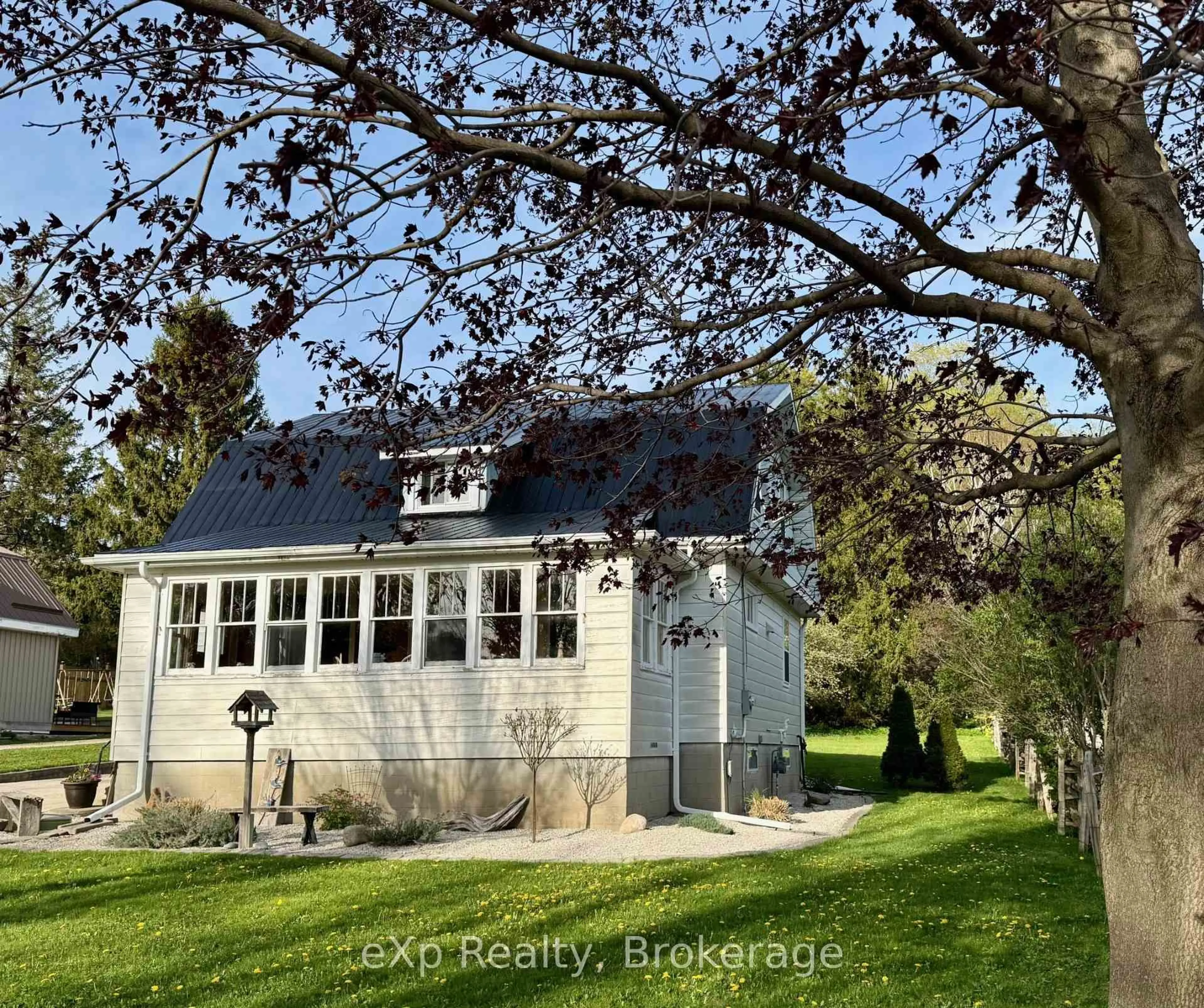 A pic from outside/outdoor area/front of a property/back of a property/a pic from drone, street for 1216 Bruce Road 12, South Bruce Ontario N0G 1W0