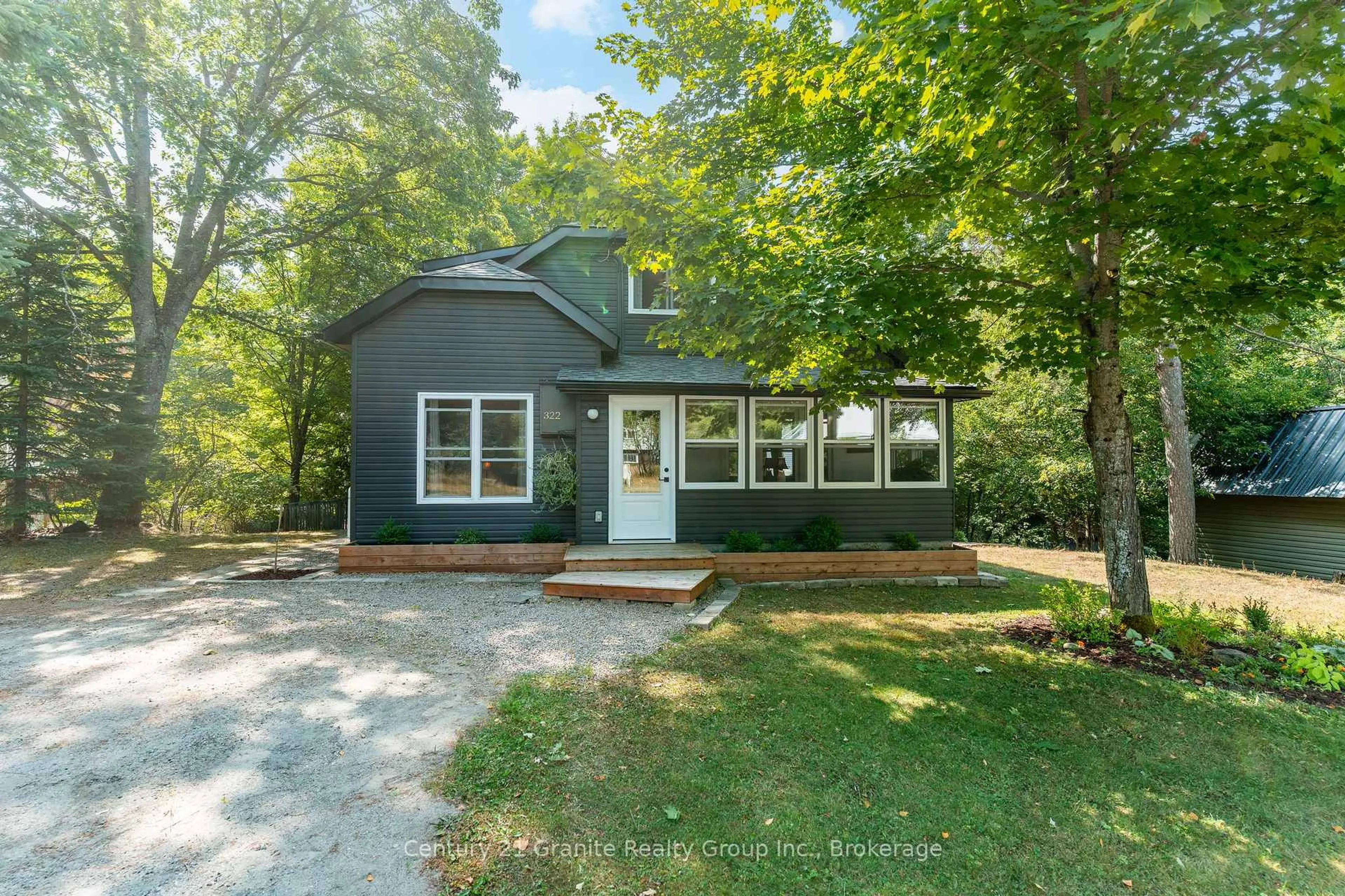 Home with vinyl exterior material, street for 322 Highland St, Dysart et al Ontario K0M 1S0