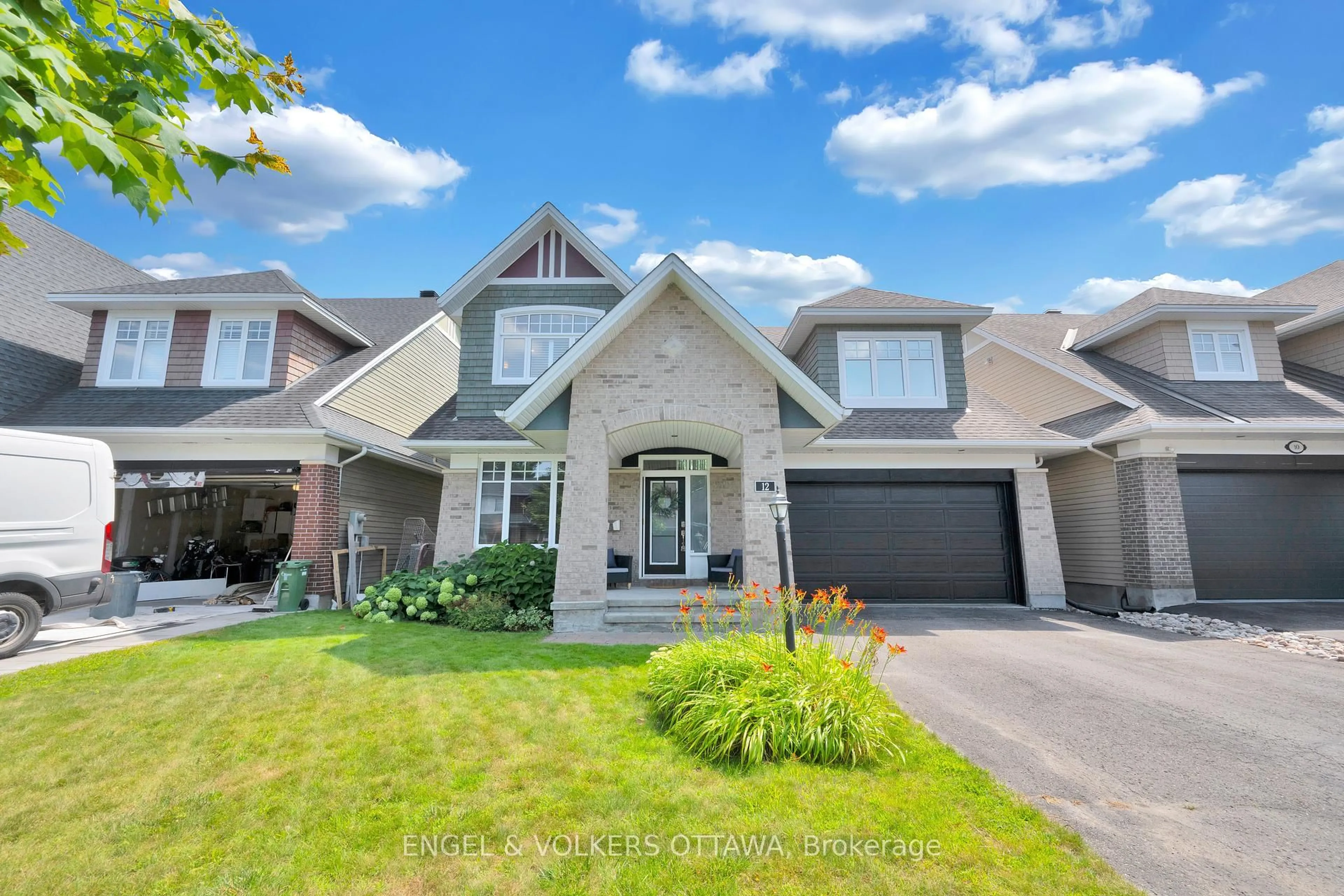 Home with brick exterior material, street for 12 Oakbriar Cres, Ottawa Ontario K2J 5E9