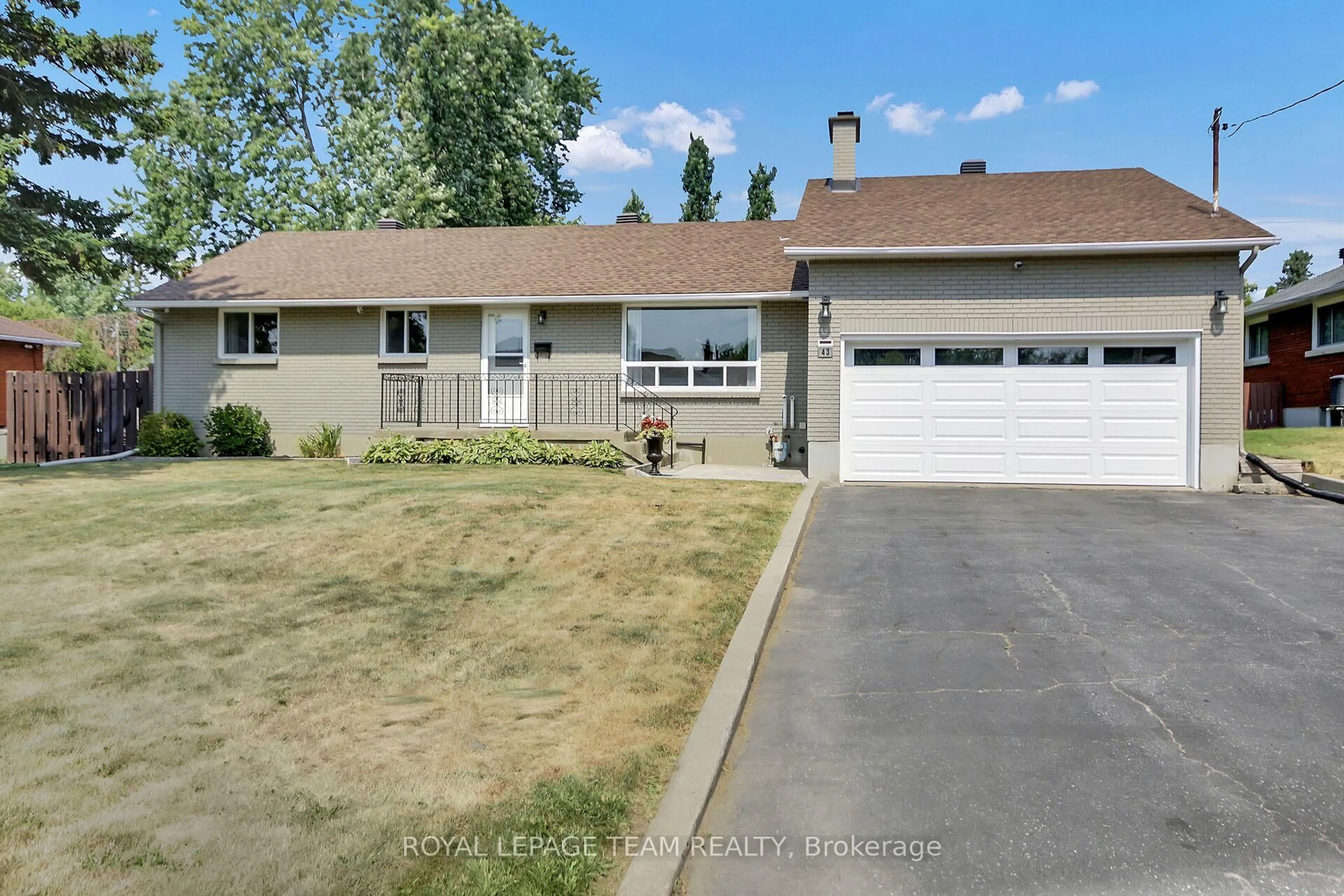 Home with vinyl exterior material, street for 43 Epworth Ave, Ottawa Ontario K2G 2L8
