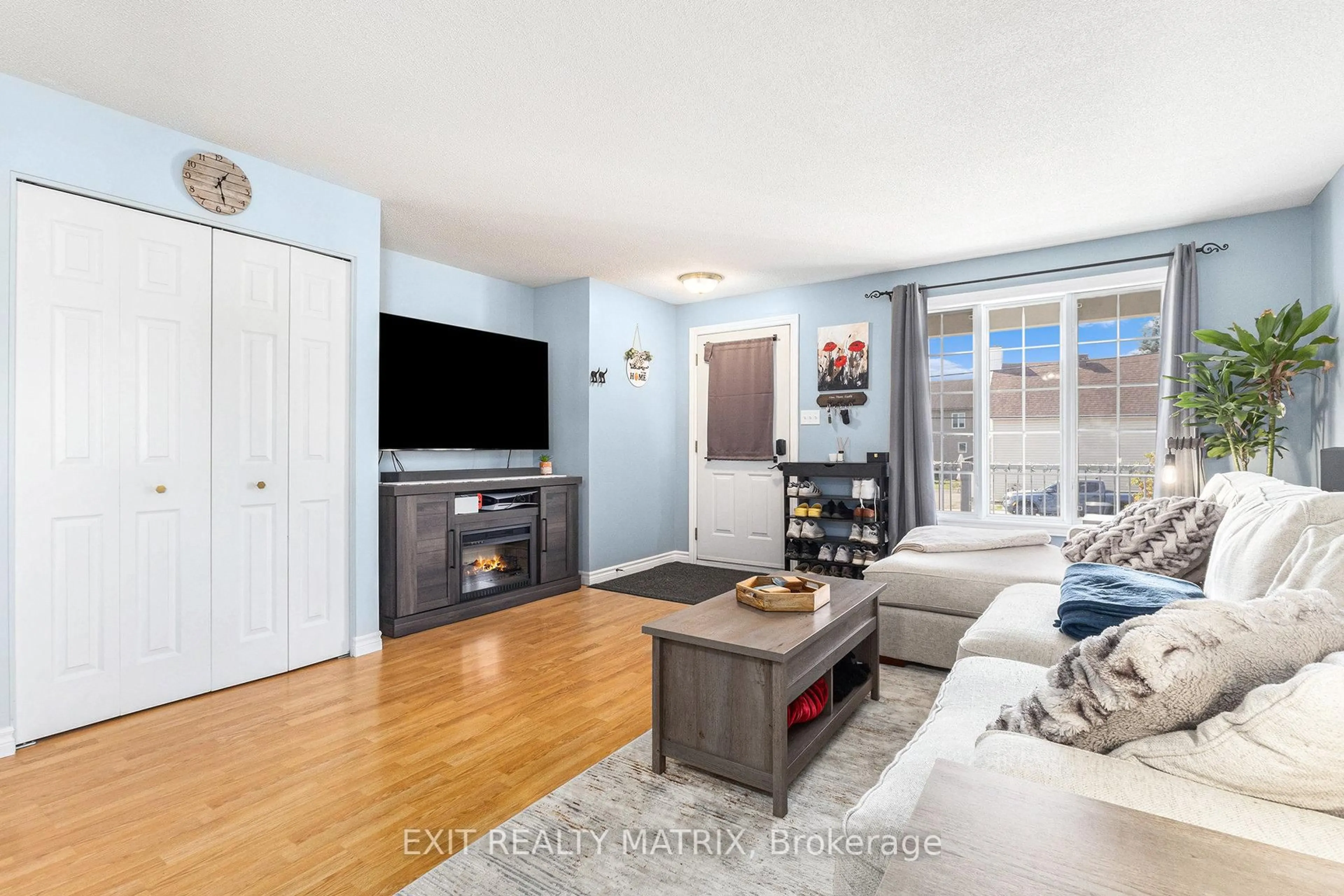 Living room with furniture, wood/laminate floor for 169 Mabel St #1, The Nation Ontario K0A 2M0