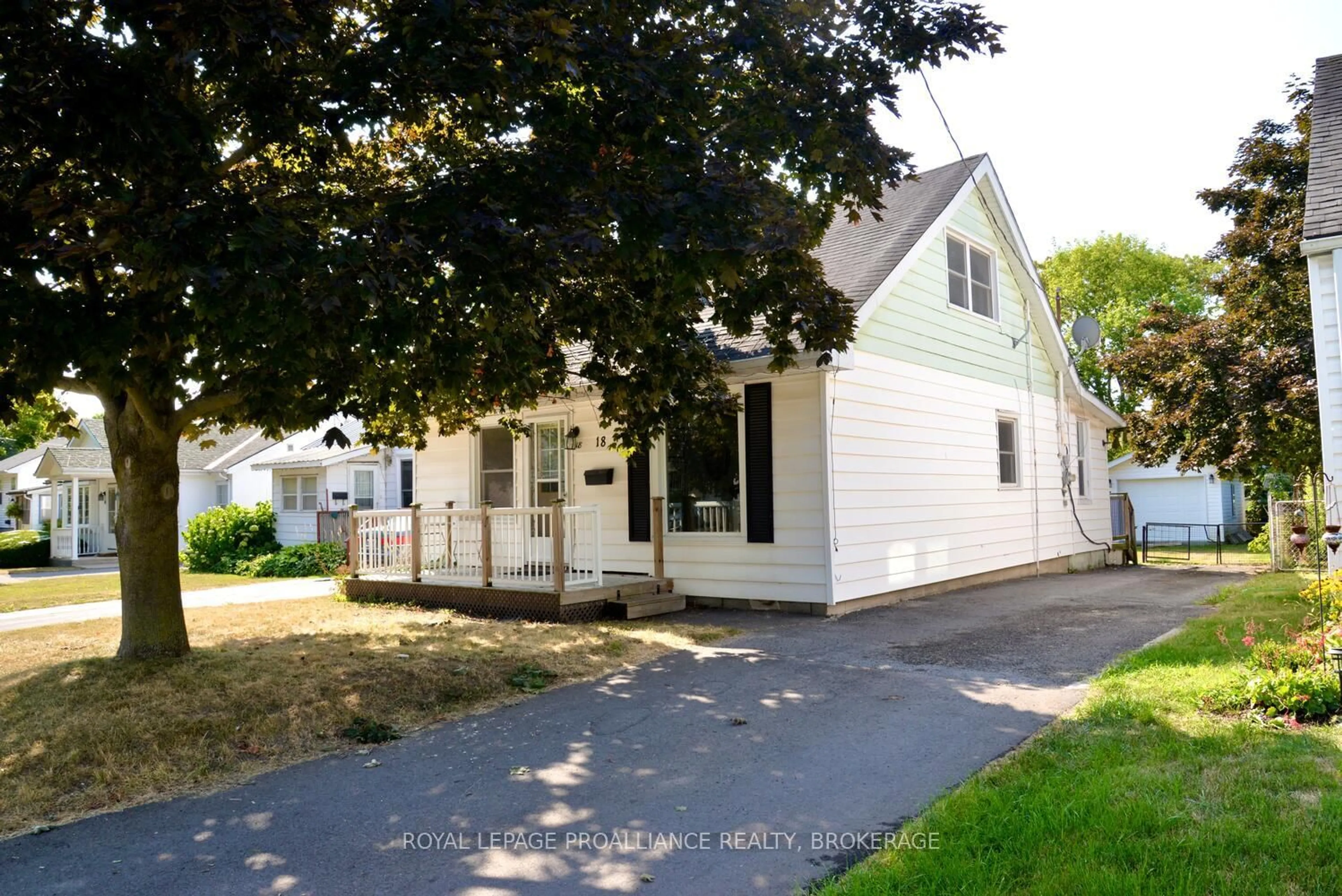 Home with vinyl exterior material, street for 18 Dunkirk Ave, Kingston Ontario K7K 2H4