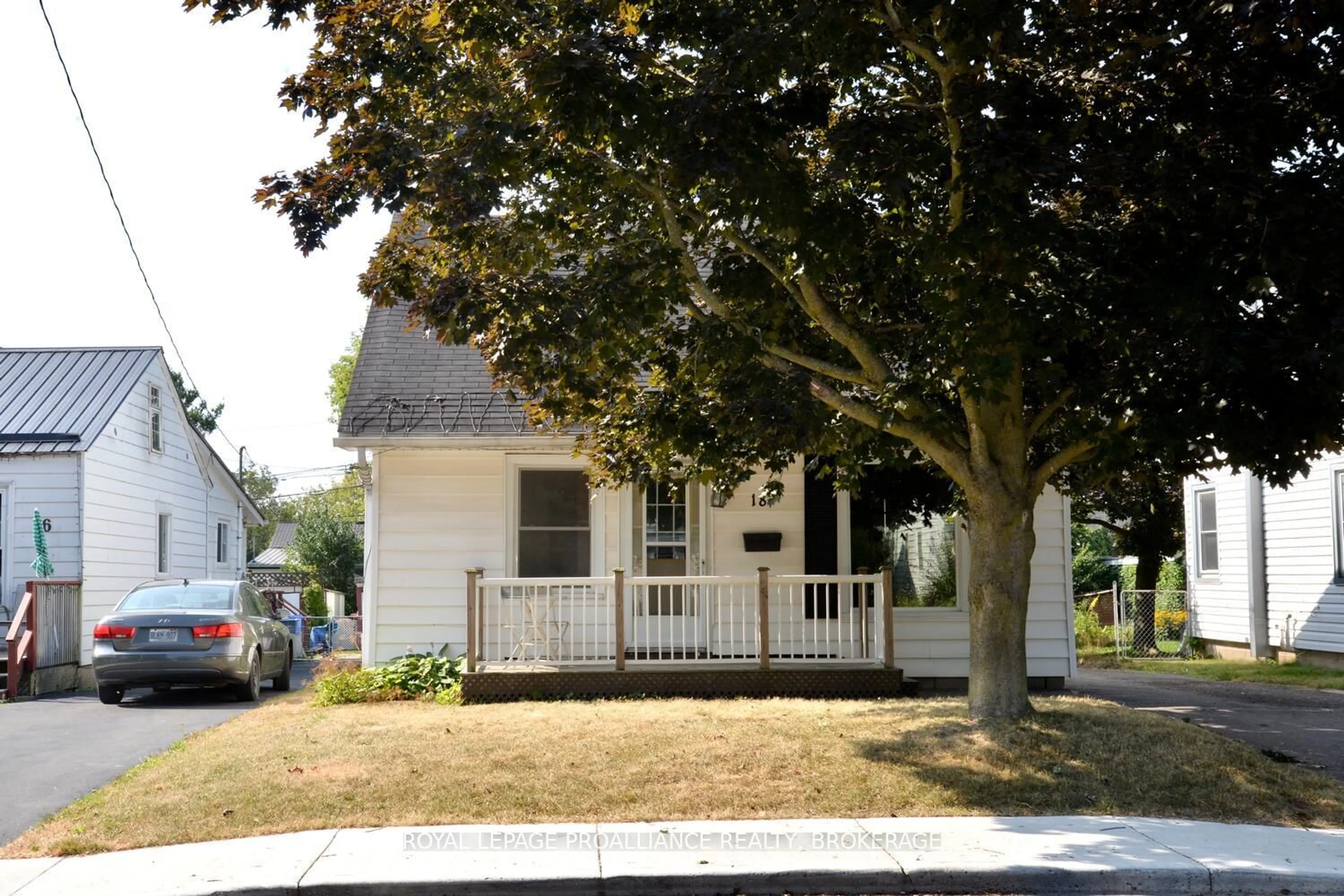 Home with vinyl exterior material, street for 18 Dunkirk Ave, Kingston Ontario K7K 2H4