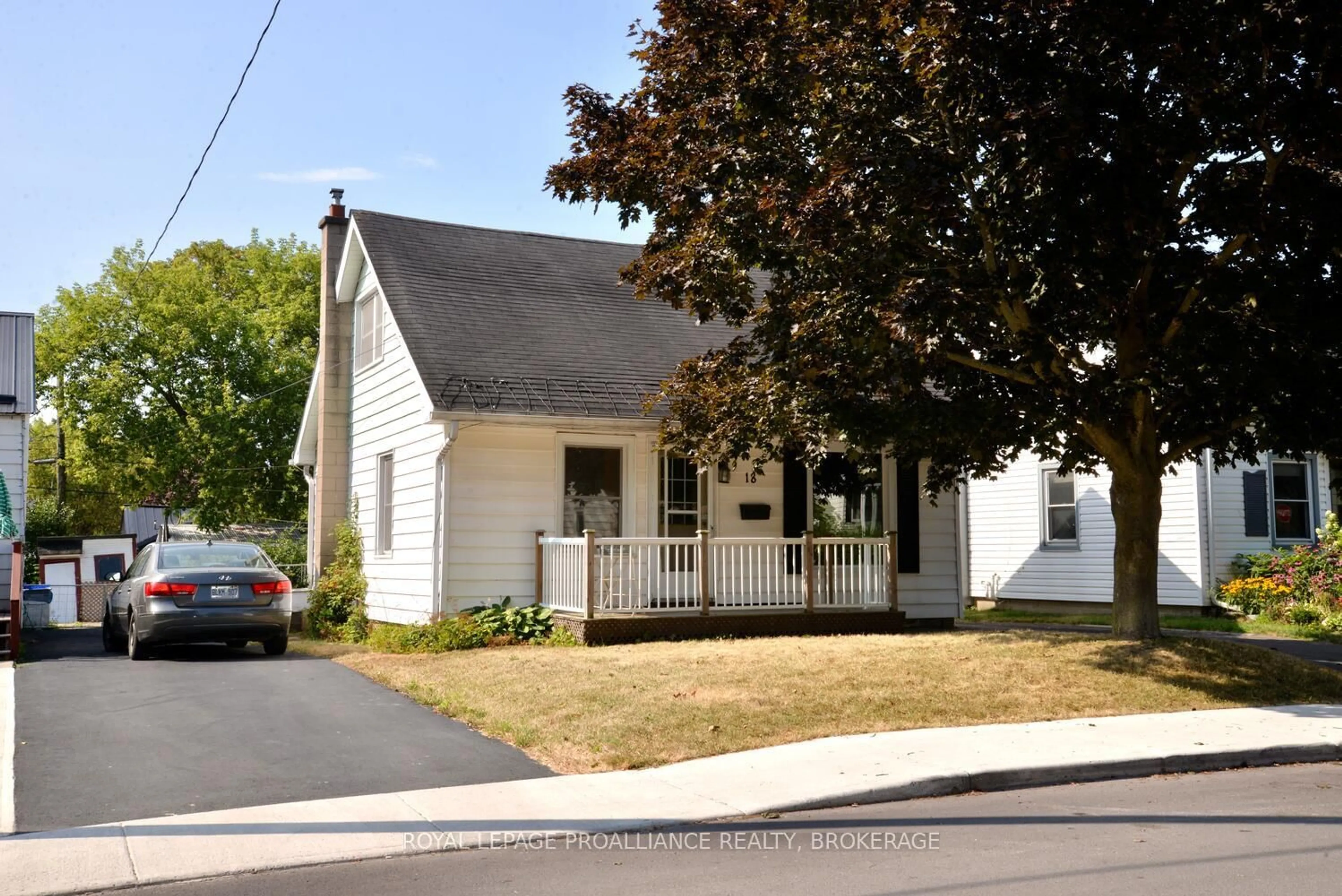 Home with vinyl exterior material, street for 18 Dunkirk Ave, Kingston Ontario K7K 2H4