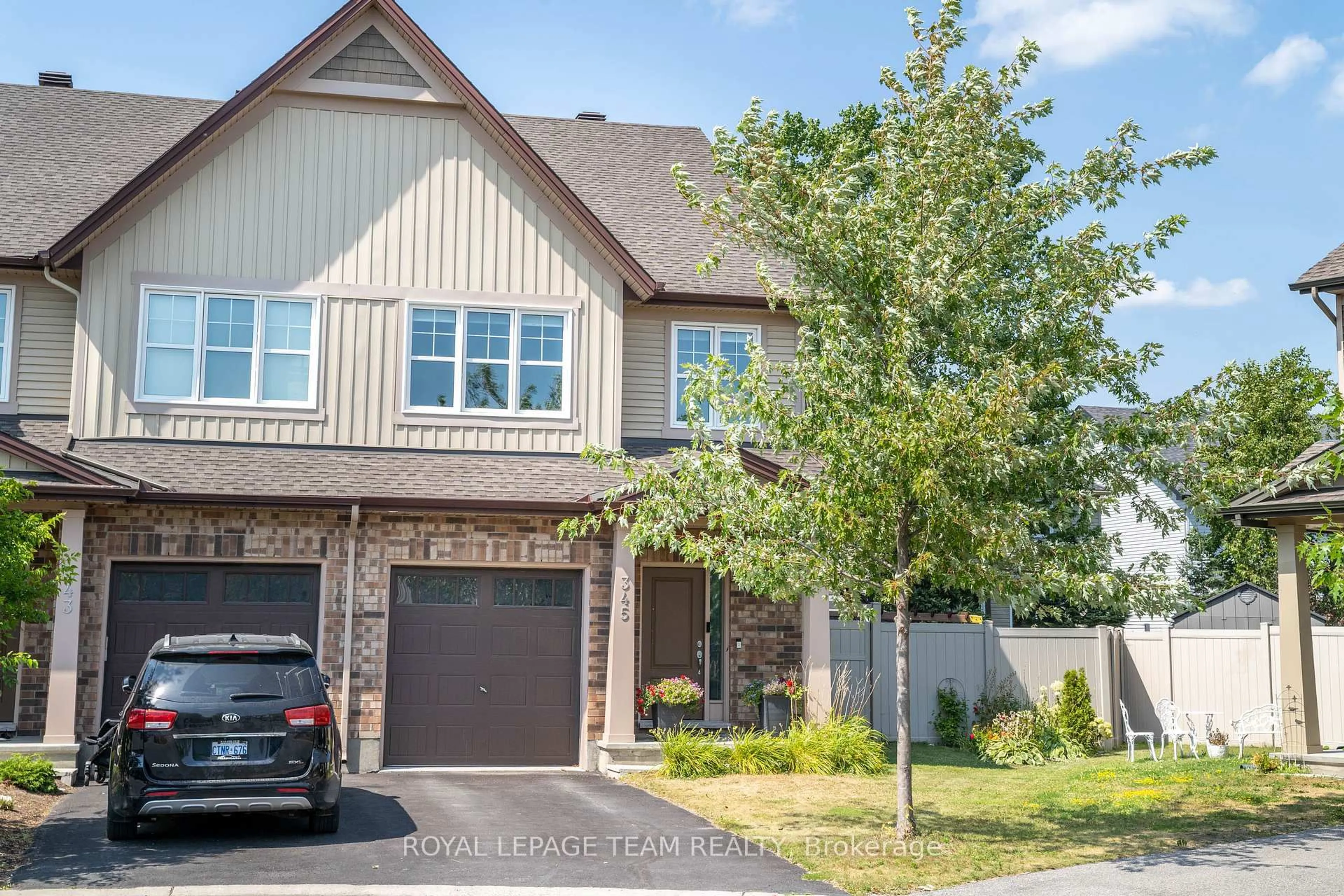 Home with brick exterior material, street for 345 Alasken Dr, Ottawa Ontario K1T 0M4