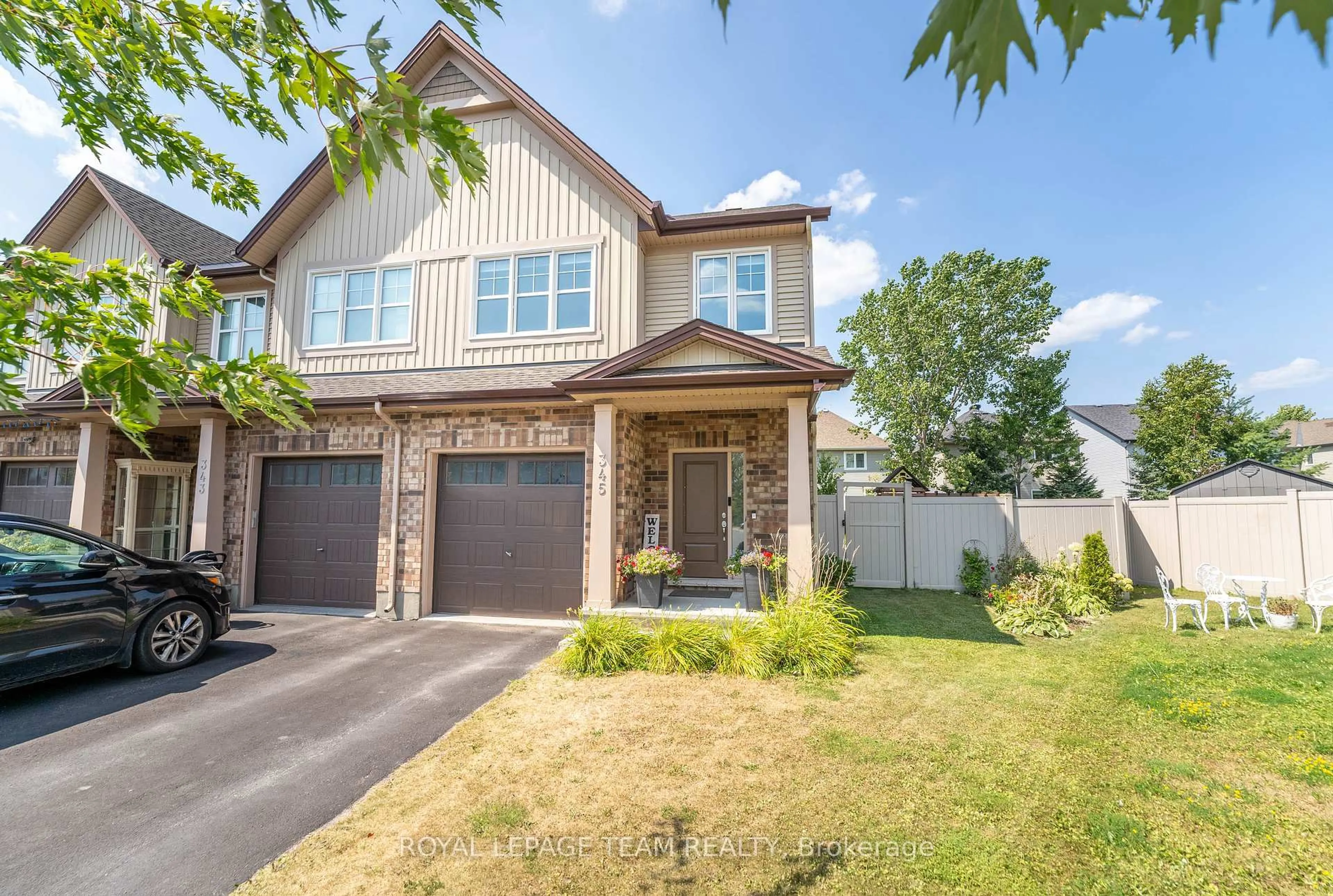 Home with brick exterior material, street for 345 Alasken Dr, Ottawa Ontario K1T 0M4